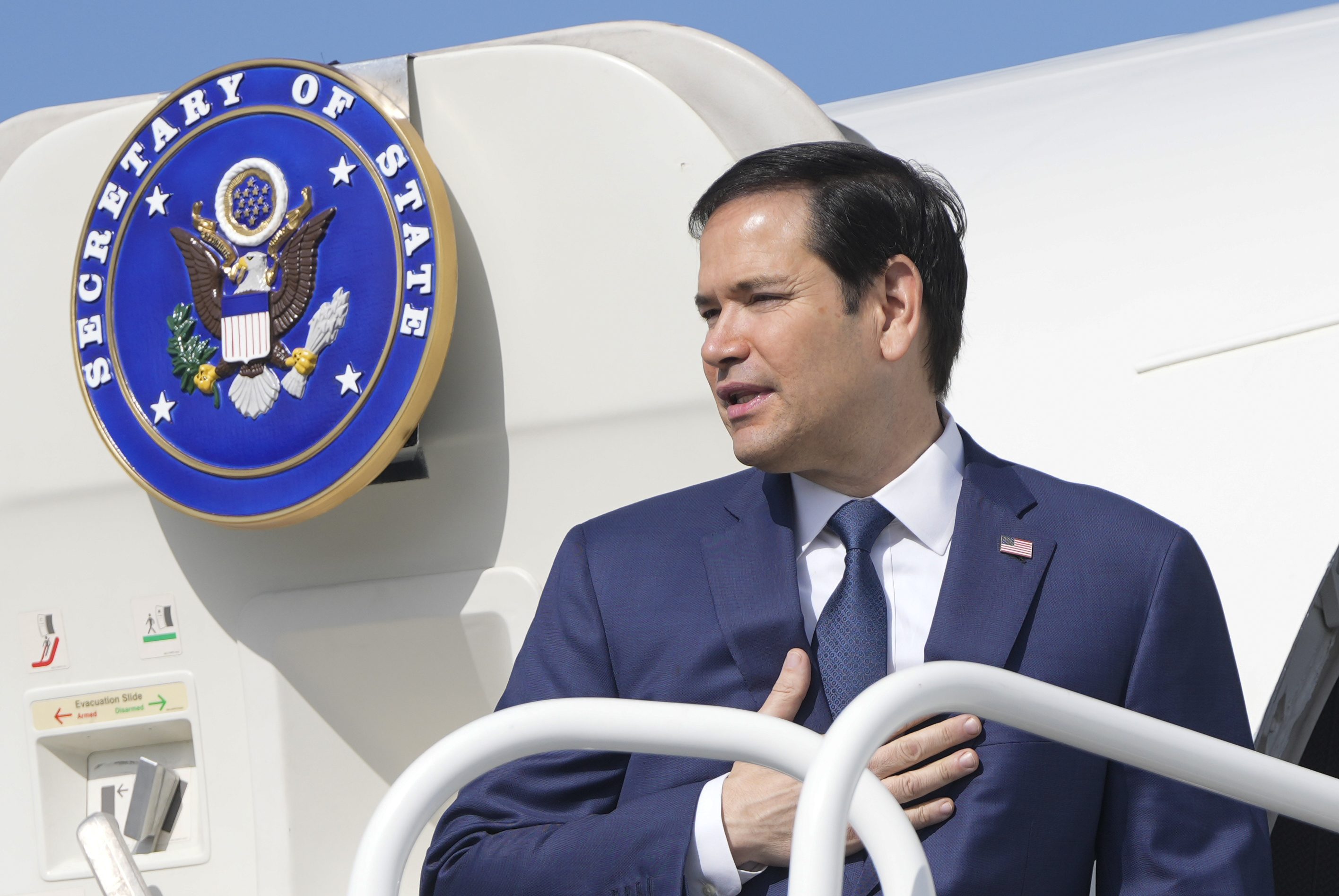 Secretary of State Marco Rubio boards a plane at Panama Pacifico International Airport in Panama City, Monday, Feb. 3, 2025, en route to El Salvador. (AP Photo/Mark Schiefelbein, Pool)