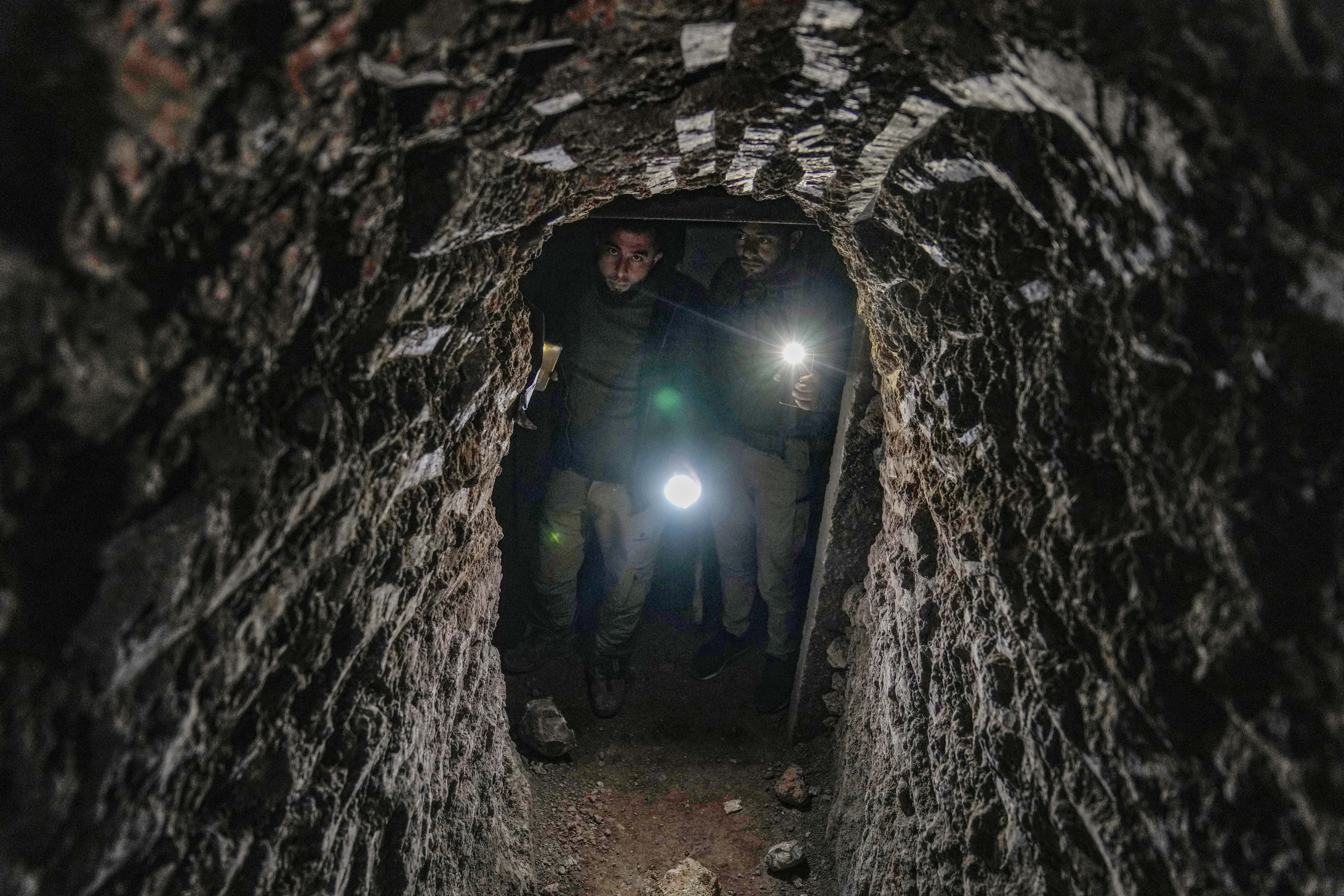 Syrians returning to the town of Tel Rifaat find homes in ruins and underground tunnels