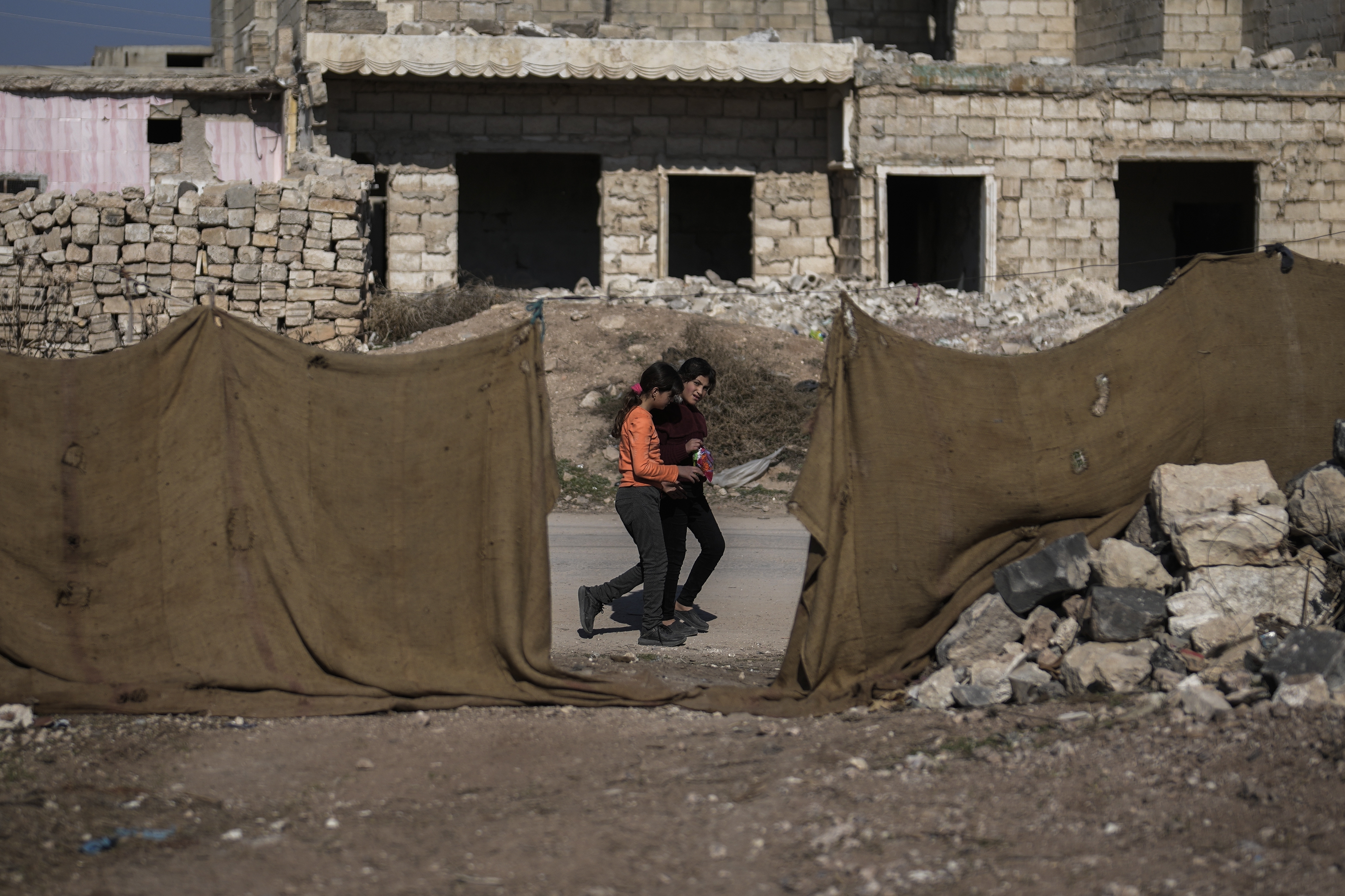 Syrians returning to the town of Tel Rifaat find homes in ruins and underground tunnels