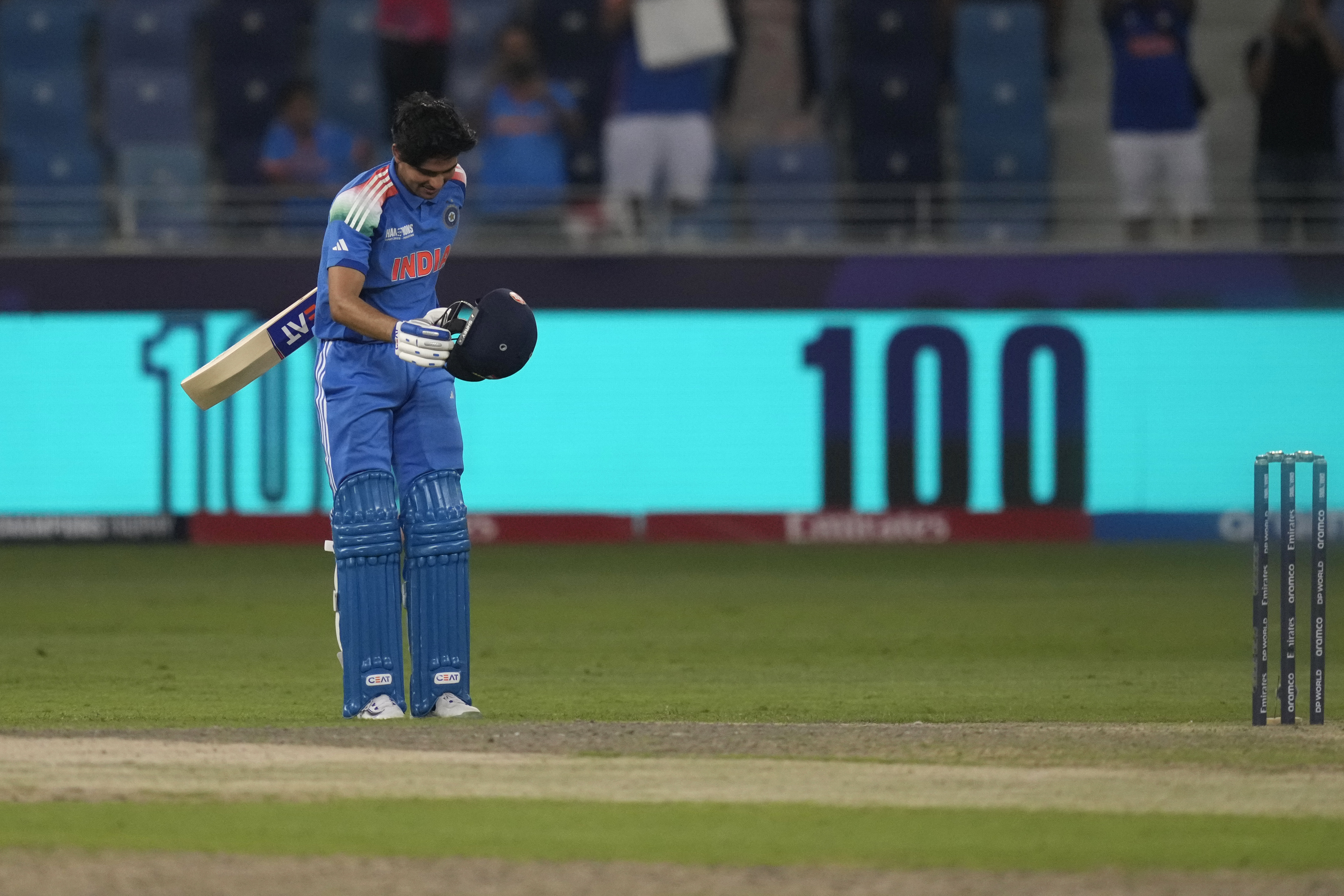 India's Shubman Gill celebrates after scoring a century during the ICC Champions Trophy cricket match between India and Bangladesh at Dubai International Cricket Stadium in Dubai, United Arab Emirates, Thursday, Feb. 20, 2025. (AP Photo/Altaf Qadri)