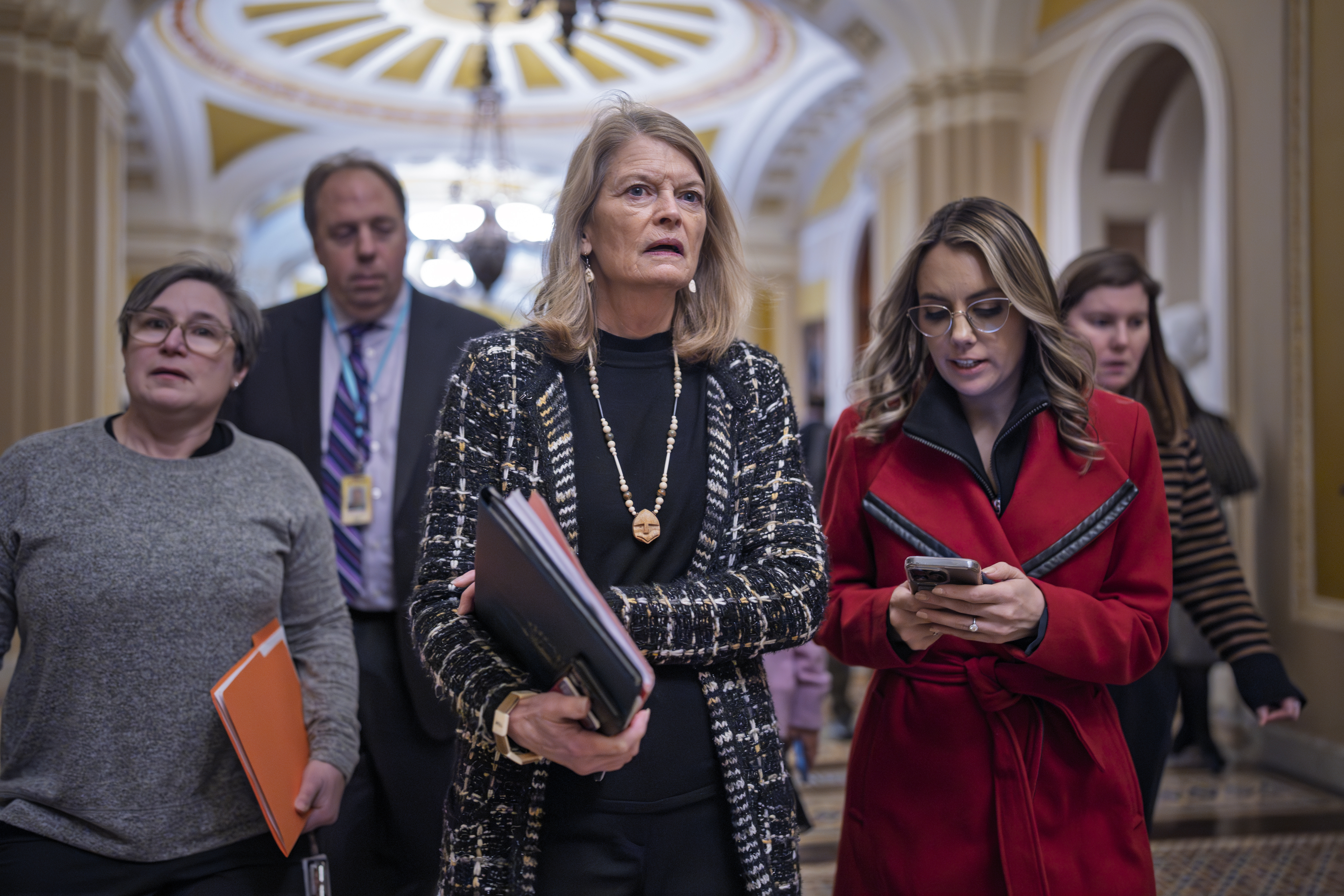 Lisa Murkowski walks through halls of Congress