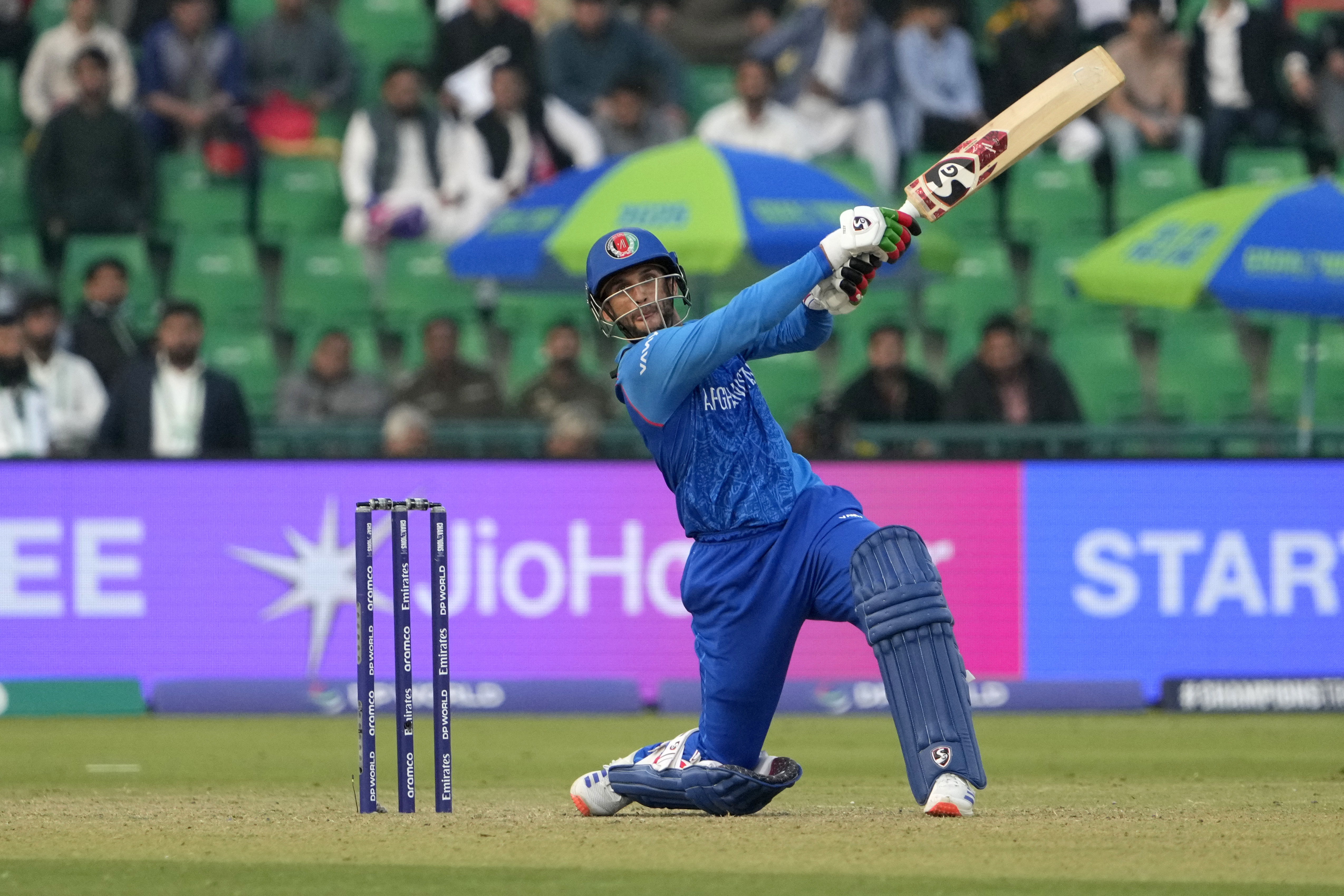 Afghanistan's Azmatullah Omarzai bats during the ICC Champions Trophy cricket match between Australia and Afghanistan, in Lahore, Pakistan, Friday, Feb. 28, 2025. (AP Photo/K.M. Chaudary)