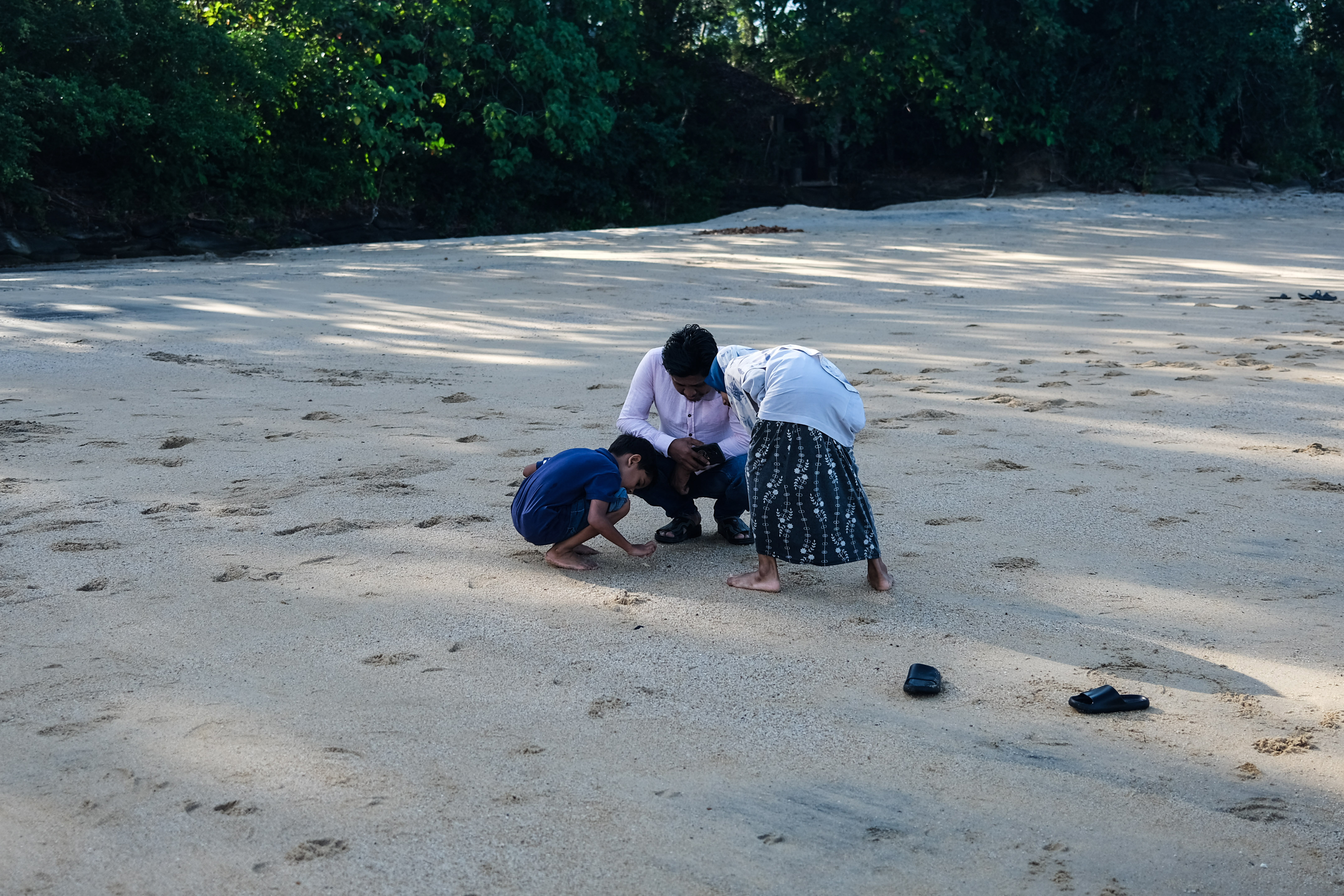 Rohingya children in Malaysia overcome fear to enjoy a day at the beach