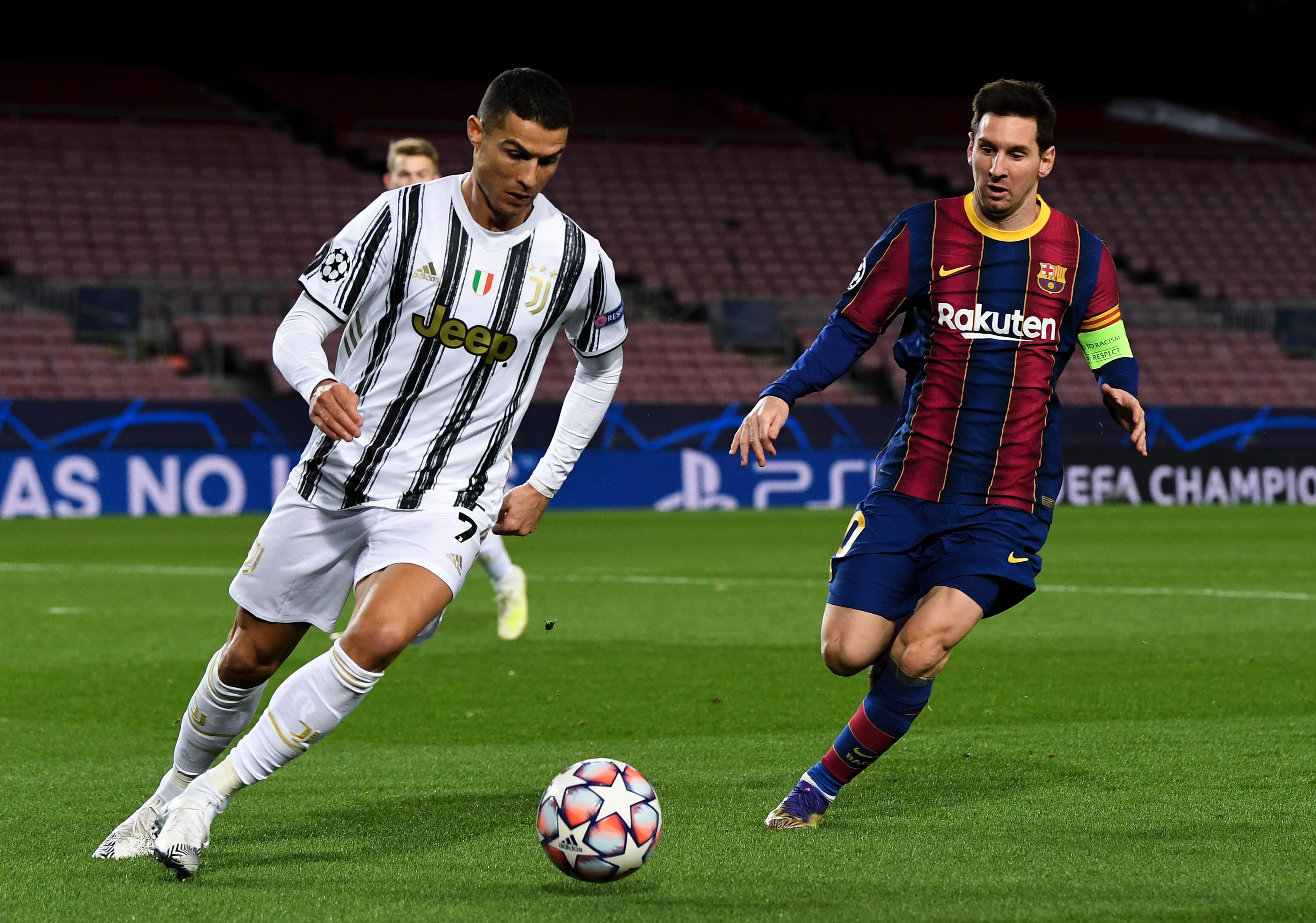 Ronaldo and Messi playing football.