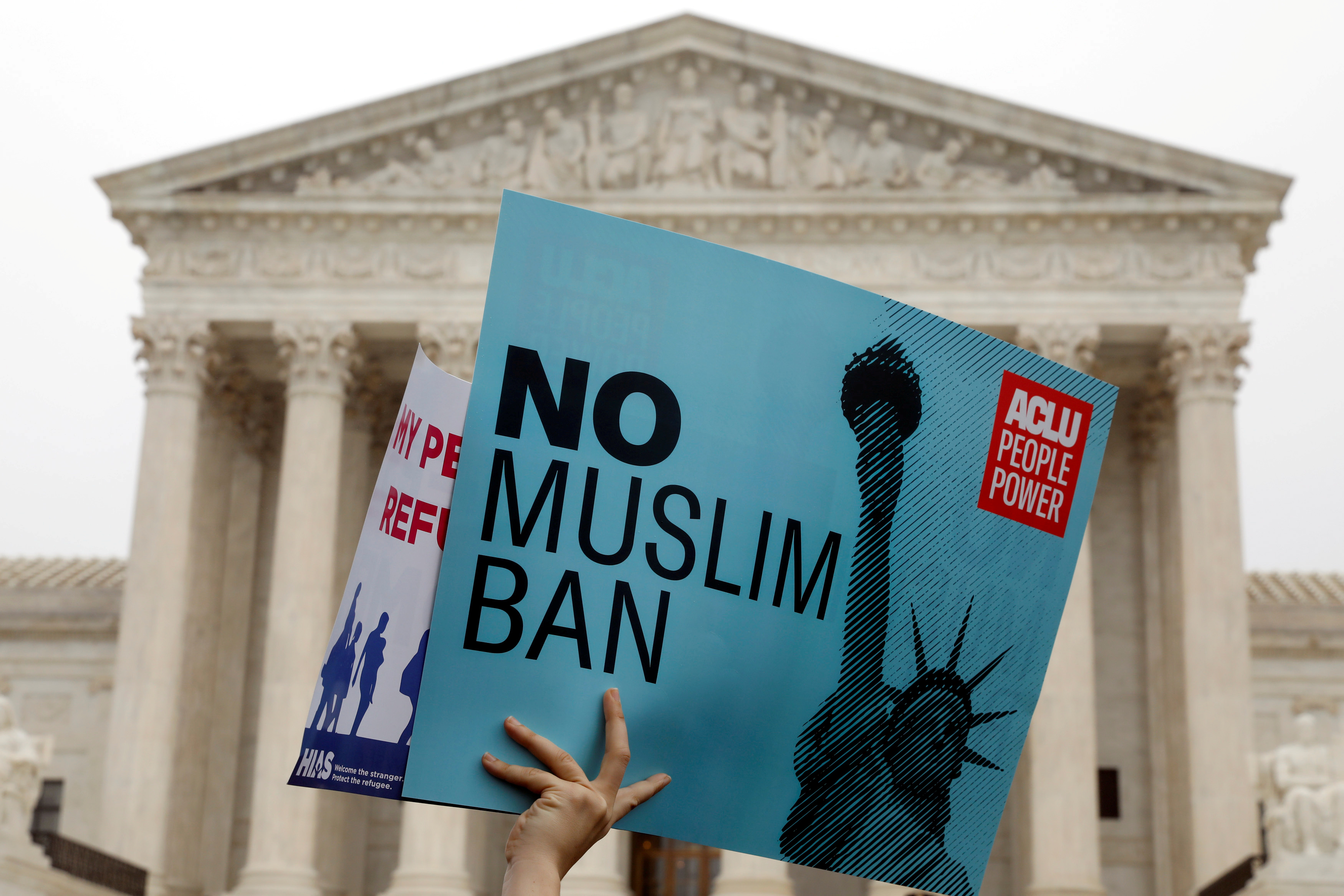Protesters rally outside the US Supreme Court.