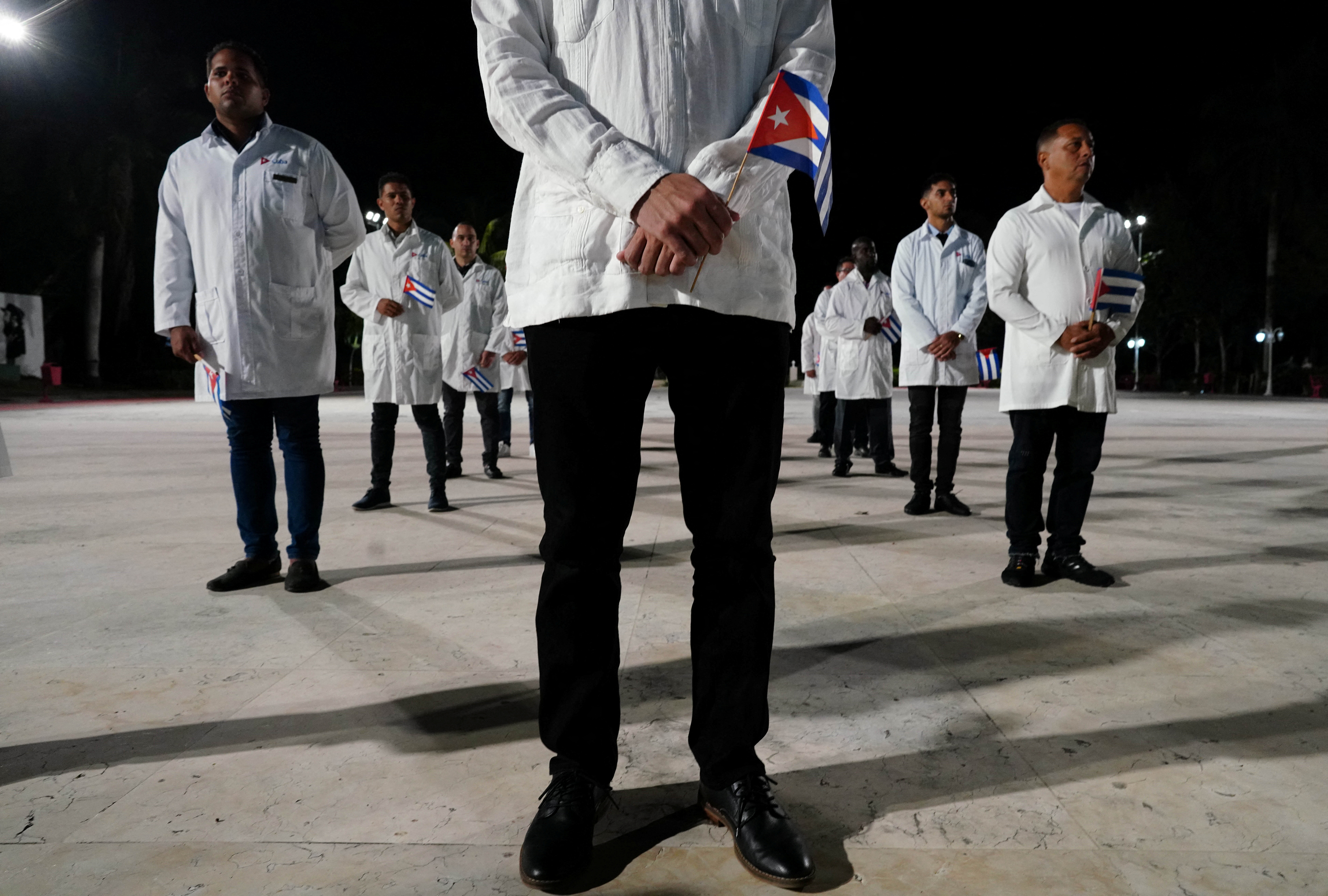 Cuban doctors take part in a farewell ceremony before they depart for Turkiye to assist in earthquake relief.
