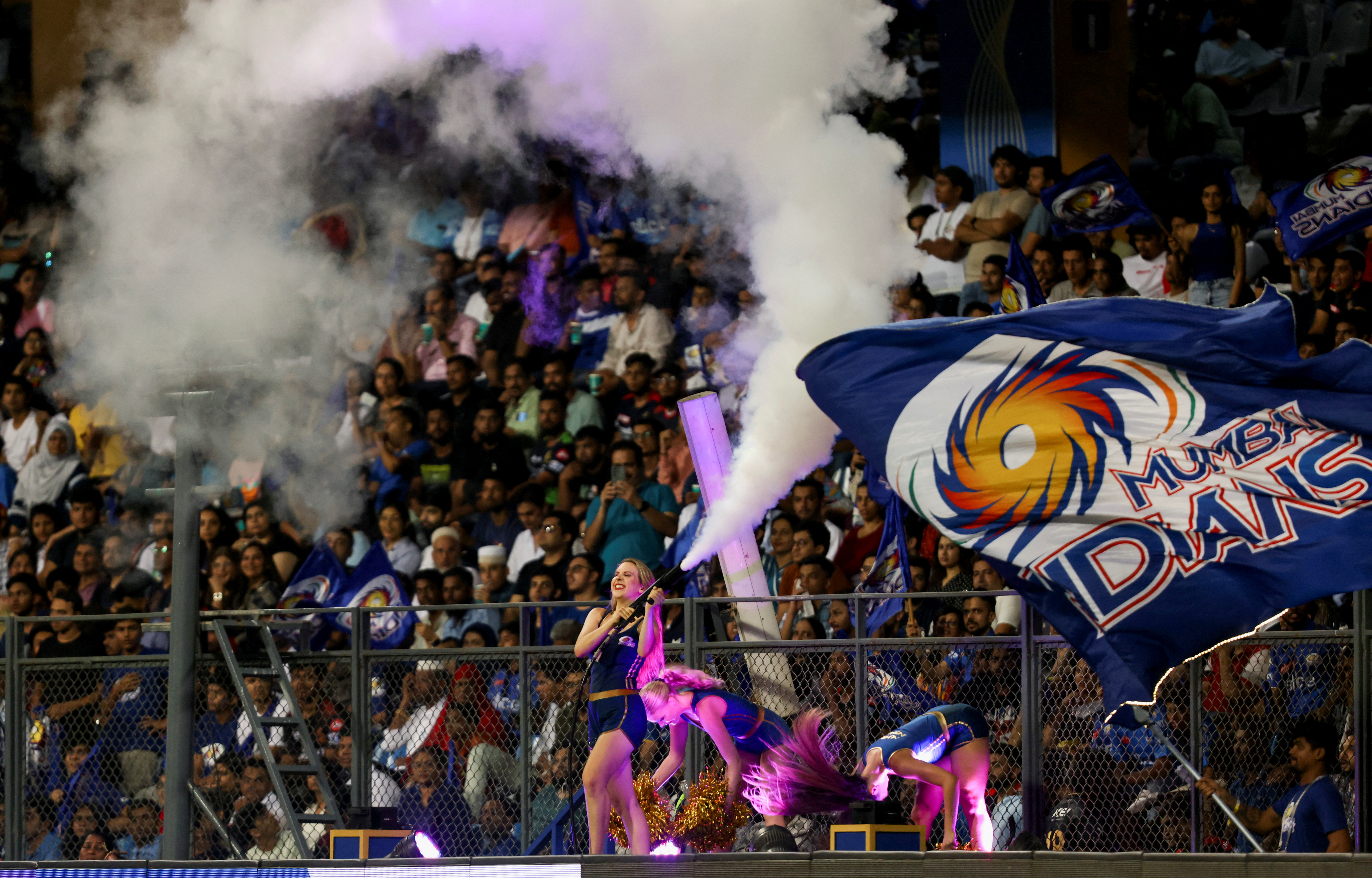 Indian Premier League- Mumbai Indians v Royal Challengers Bangalore- Wankhede Stadium, Mumbai, India - May 9, 2023. Mumbai Indians' cheerleaders celebrate during the match. REUTERS/Francis Mascarenhas “EDITORIAL USE ONLY. NO COMMERCIAL USE.”