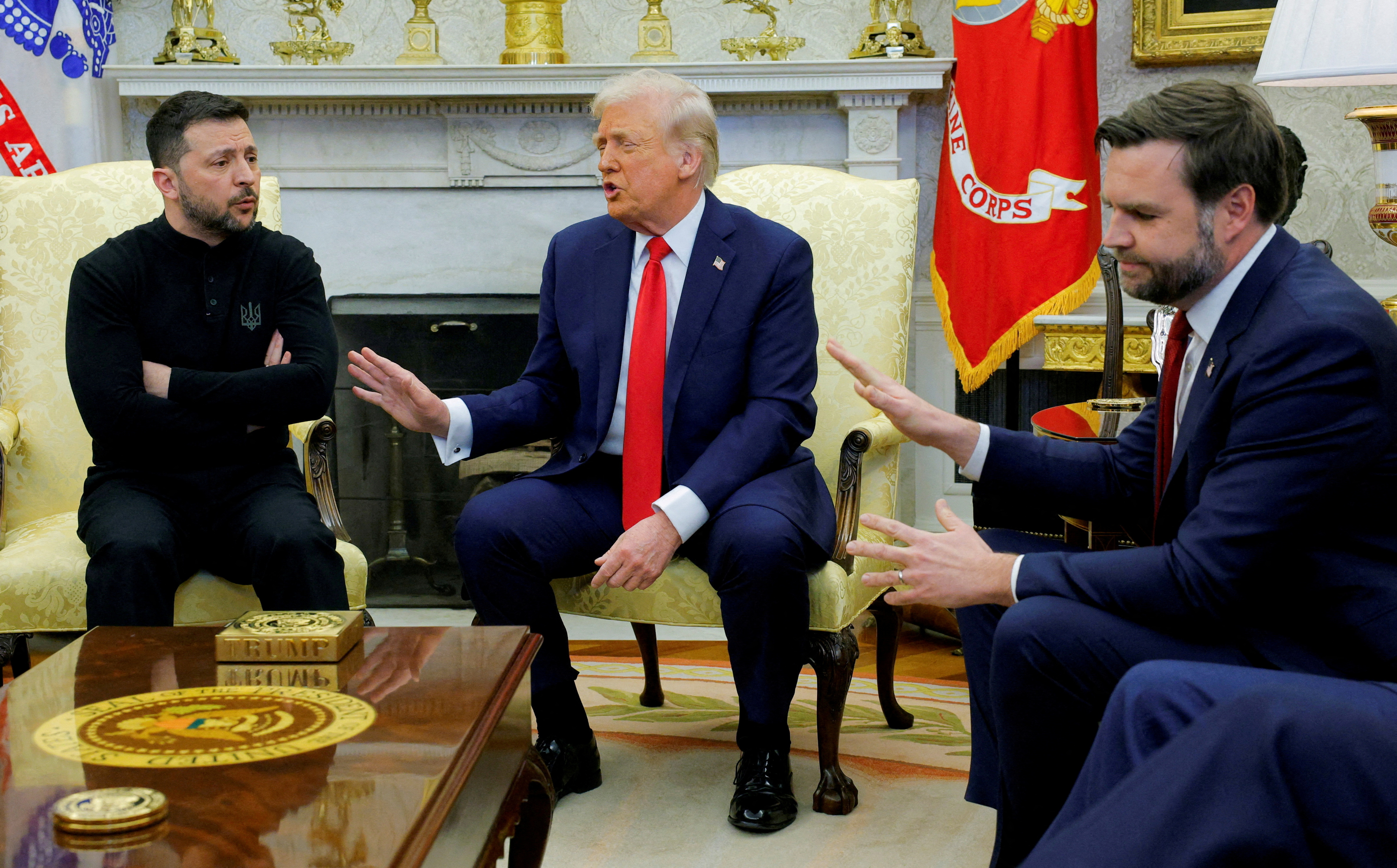 FILE PHOTO: U.S. President Donald Trump meets with Ukrainian President Volodymyr Zelenskiy as U.S. Vice President JD Vance reacts at the White House in Washington, D.C., U.S., February 28, 2025. REUTERS/Brian Snyder/File Photo