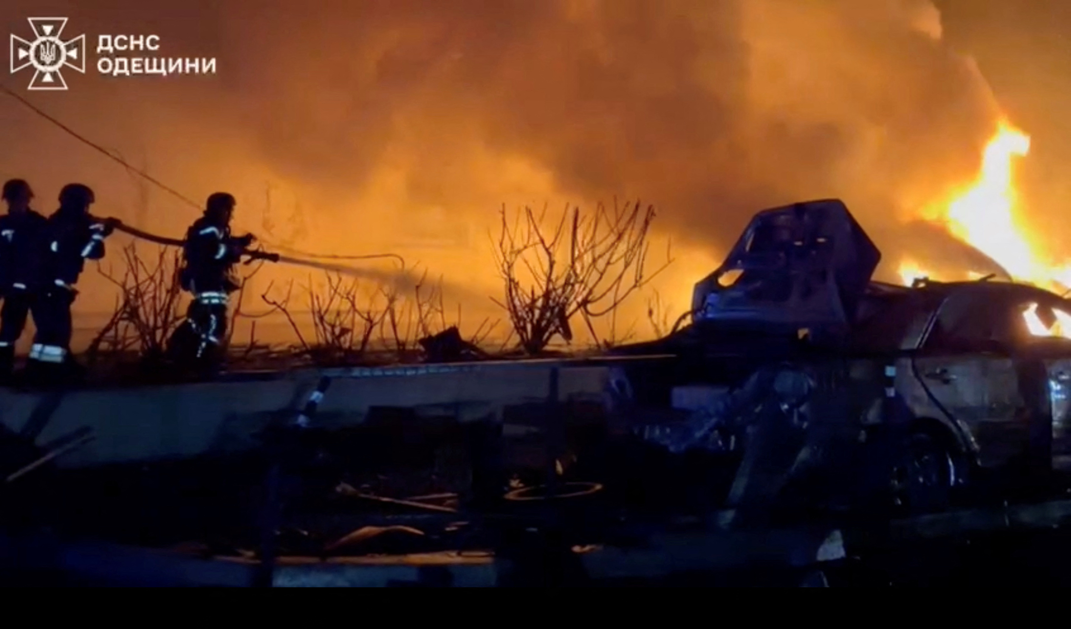 Firefighters work to control a fire in Odesa, Ukraine