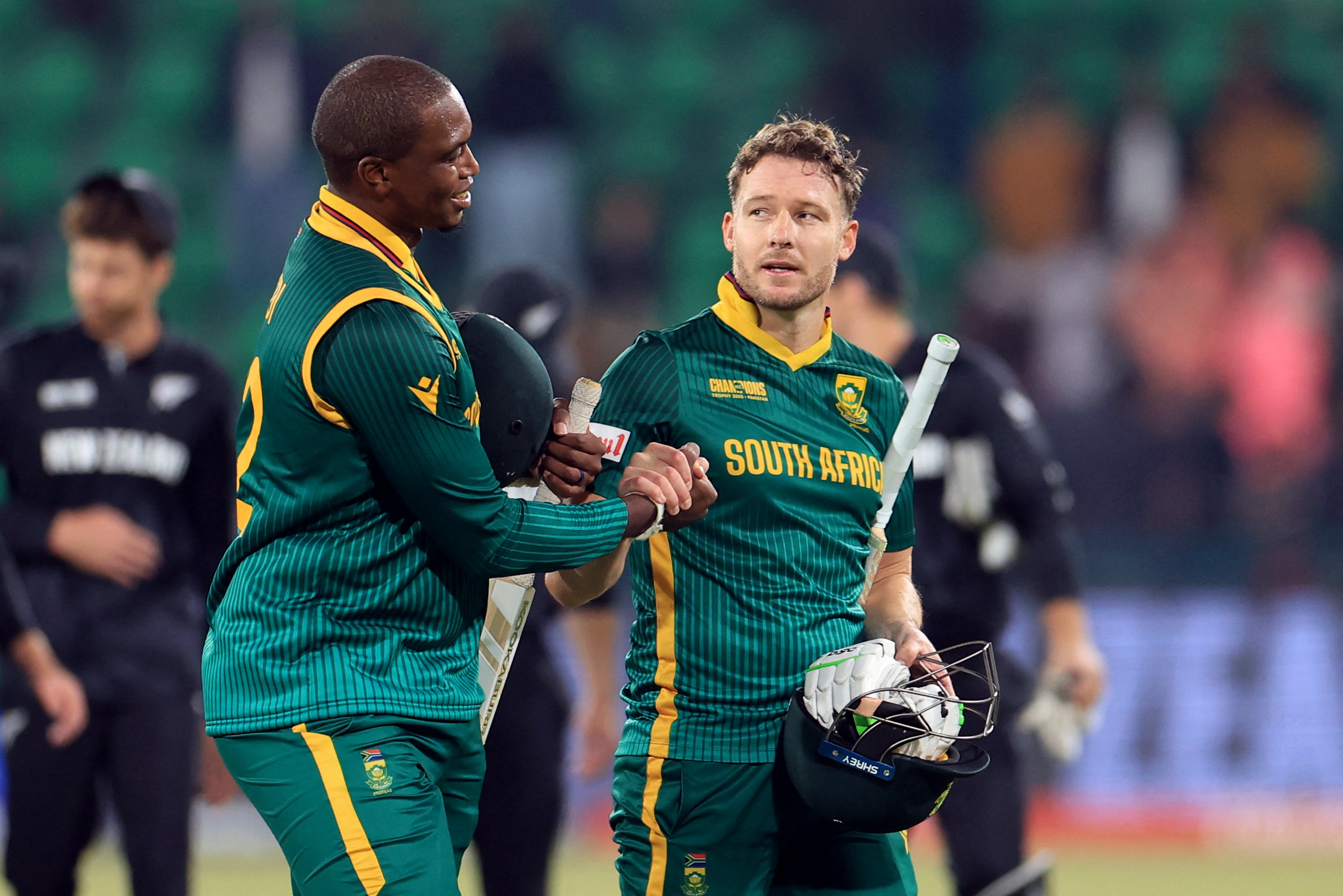 Cricket - ICC Men's Champions Trophy - Semi Final - South Africa v New Zealand - Gaddafi Stadium, Lahore, Pakistan - March 5, 2025 South Africa's David Miller and Lungi Ngidi look dejected after the match REUTERS/Akhtar Soomro