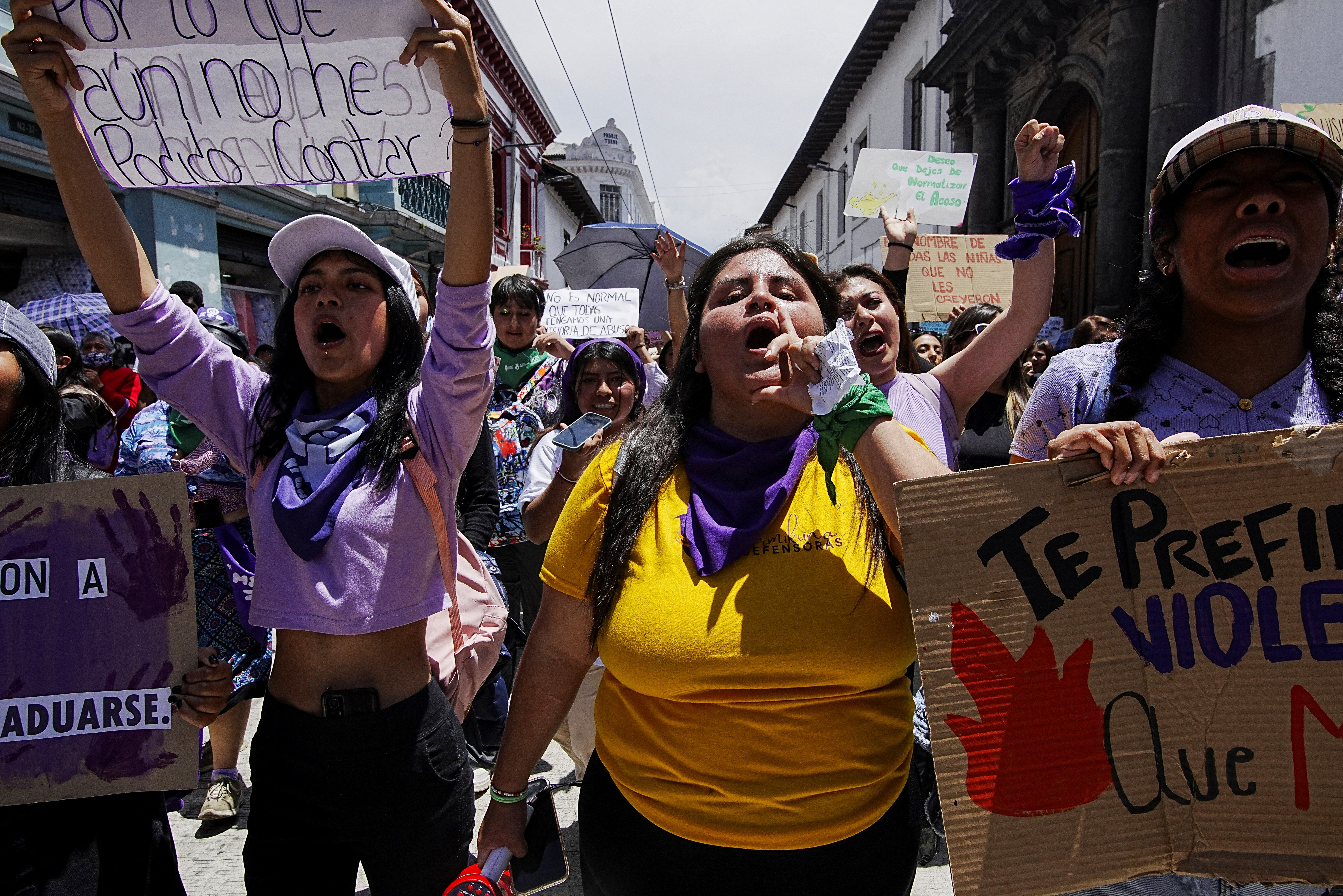 Women react as they march to mark International Women's Day, in Quito, Ecuador March 8, 2025. REUTERS/Cristina Vega