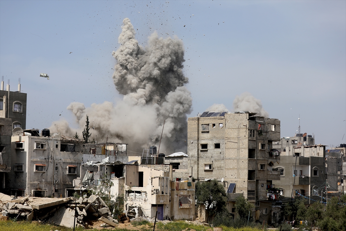 smoke rises from residential buildings