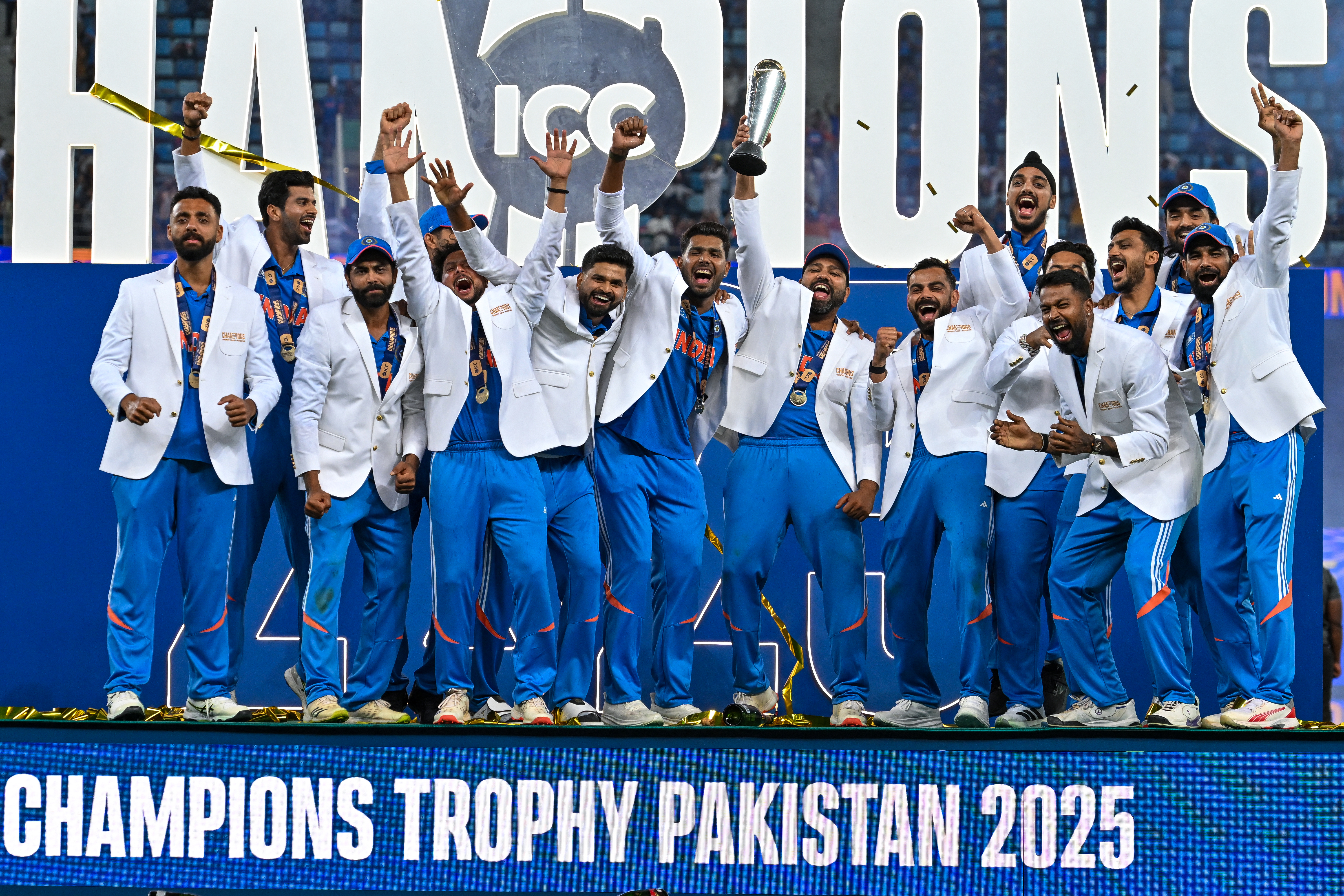 Indian cricketers celebrate after winning the ICC Champions Trophy