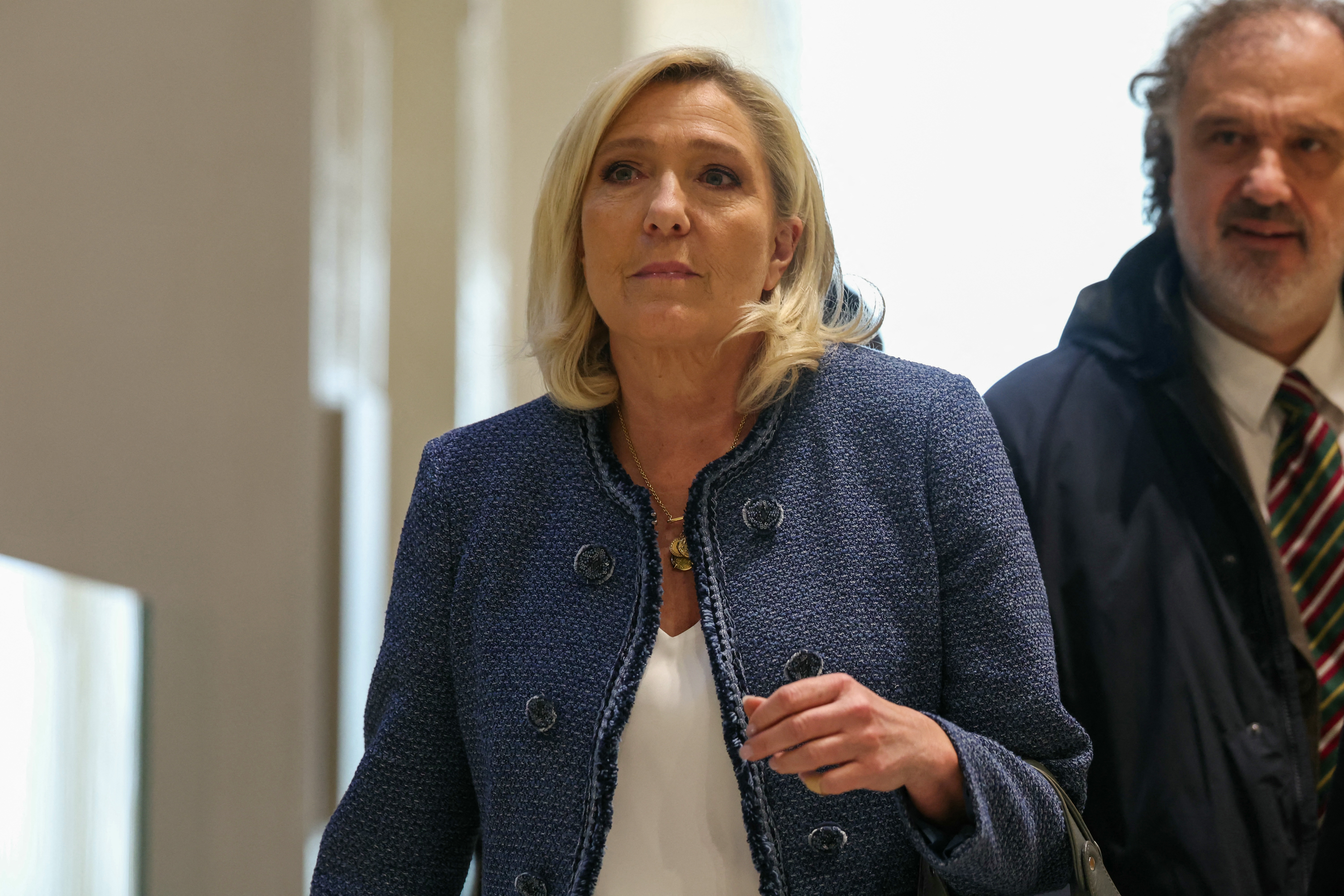 Marine Le Pen arrives at the Paris court.