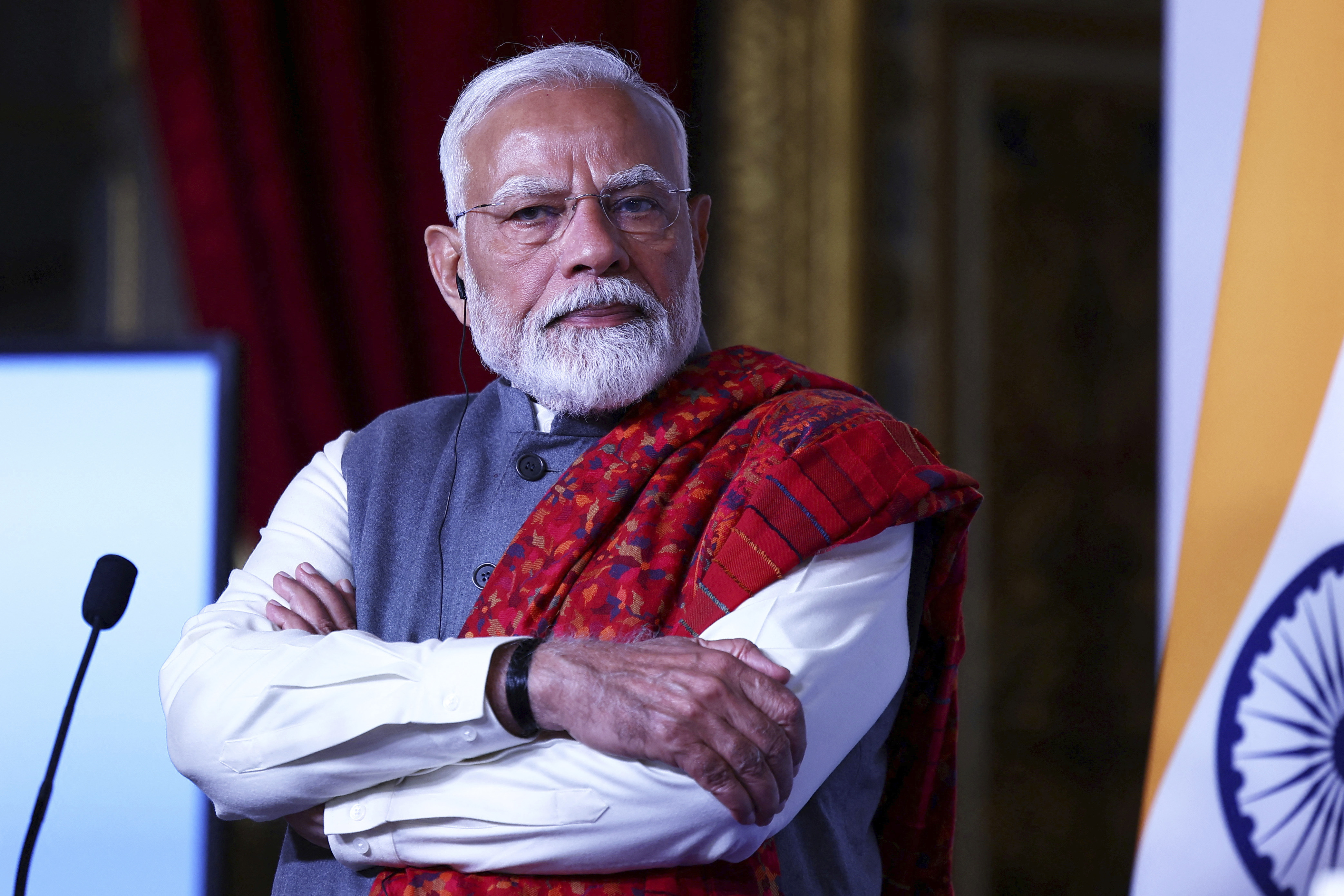 Indian Prime Minister Narendra Modi listens during the closing session of the Franco-Indian Economic Forum at the Quai d'Orsay on the sidelines of the Artificial Intelligence Action Summit in Paris, Tuesday, Feb. 11, 2025. (Abdul Saboor, Pool Photo via AP)