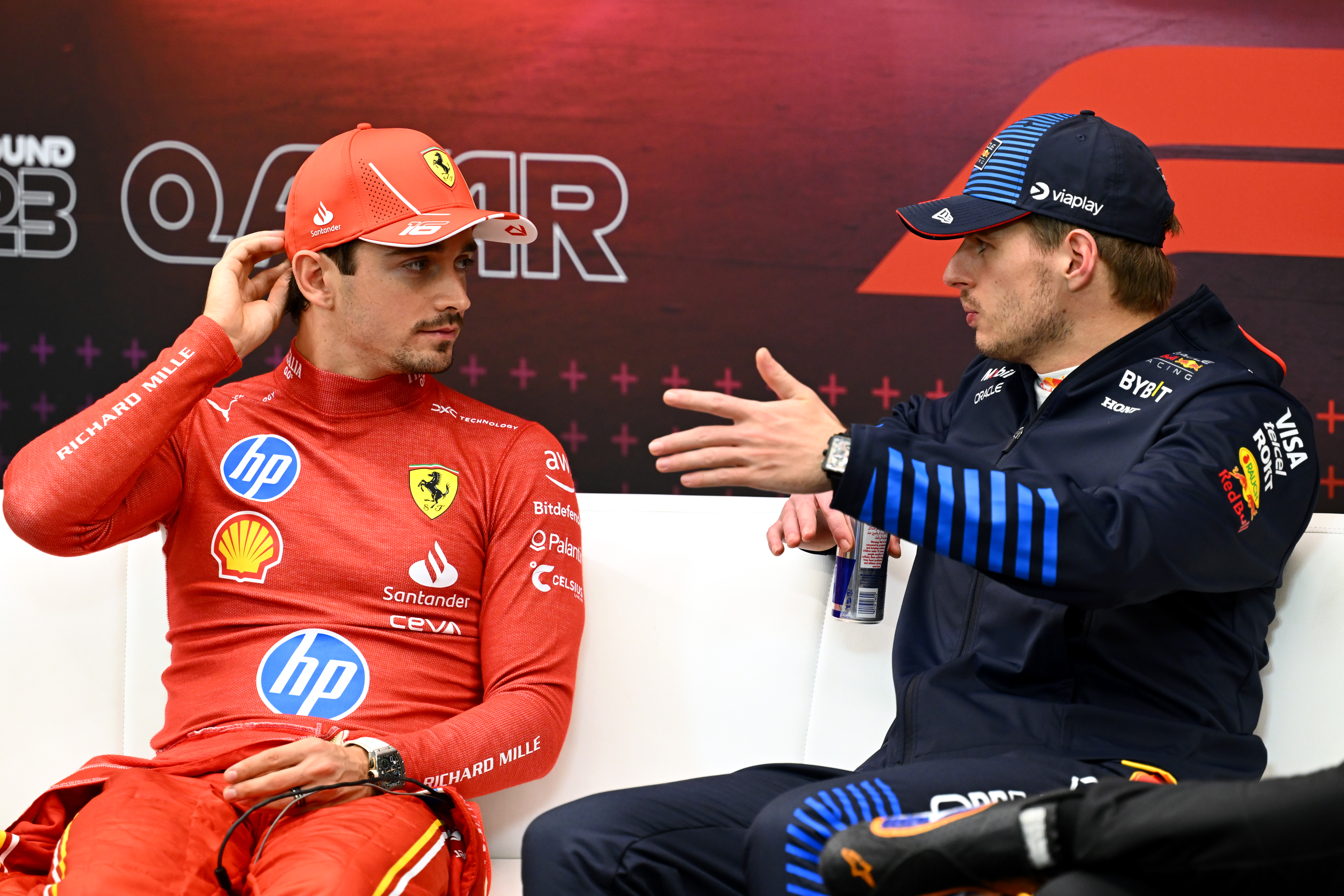 Charles Leclerc and Max Verstappen react.