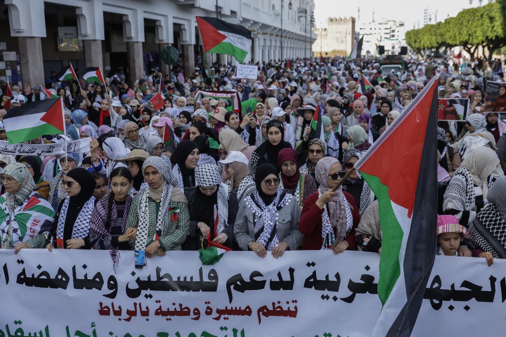 Pro-Palestine protesters take part in a demonstration against Morocco’s diplomatic ties with Israel.