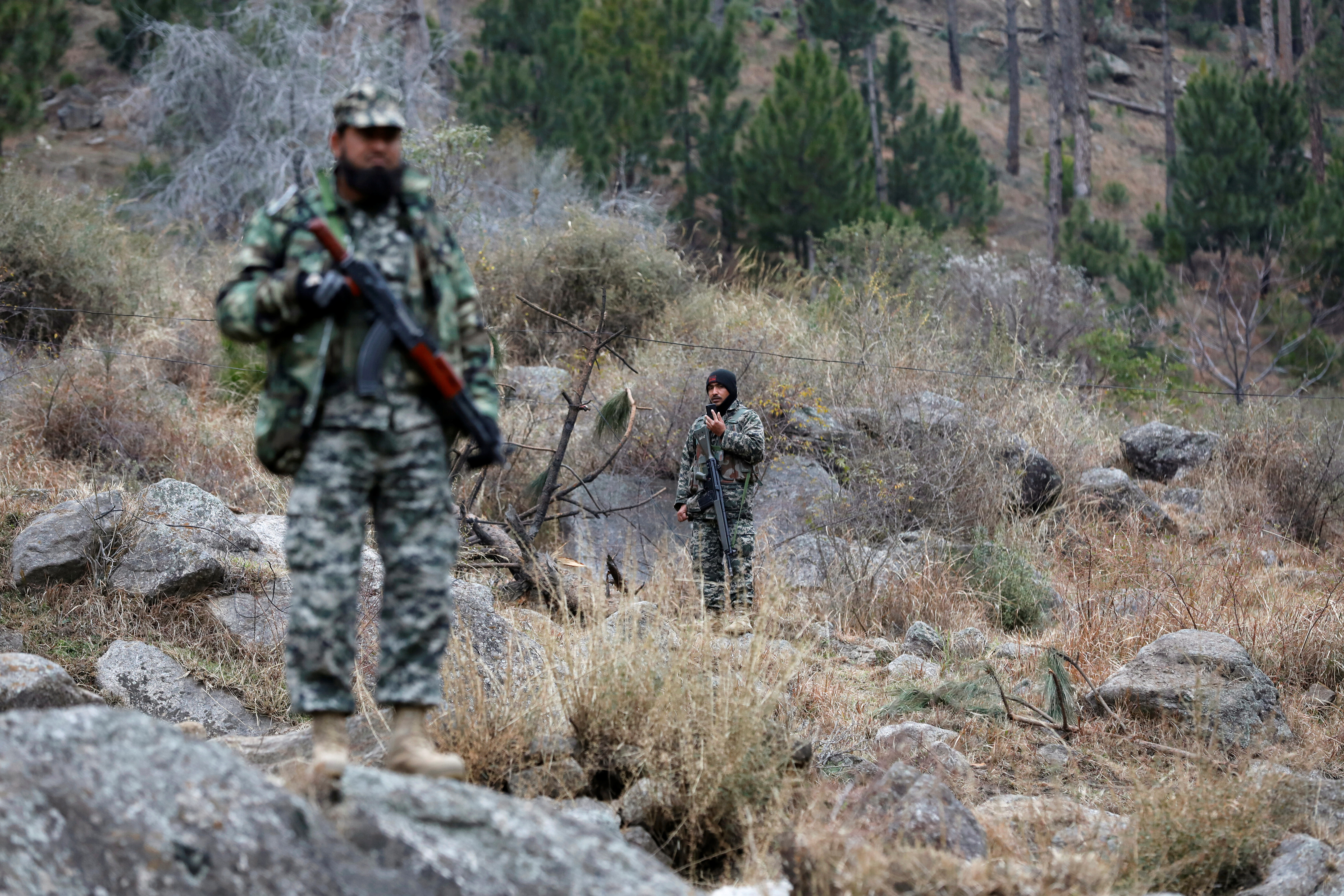 Pakistan's army soldiers guard the area, after Indian military aircrafts struck on February 26, according to Pakistani officials, in Jaba village, near Balakot, Pakistan, March 7, 2019. REUTERS/Akhtar Soomro