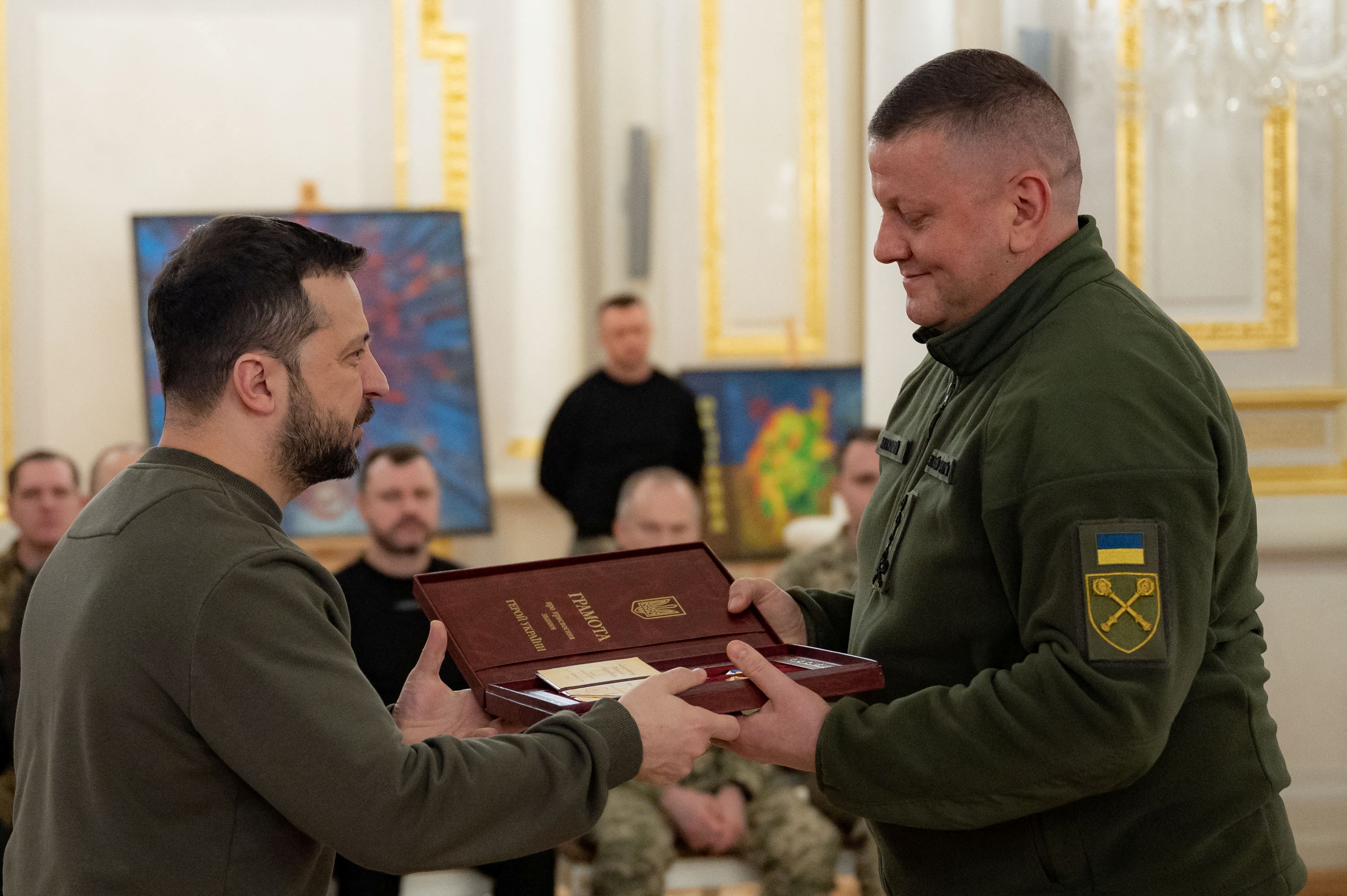 Ukraine's President Volodymyr Zelenskiy awards former Commander in Chief of the Ukrainian Armed Forces Valerii Zaluzhnyi with the Hero of Ukraine Gold Star during a ceremony, amid Russia's attack on Ukraine, in Kyiv, Ukraine February 9, 2024. Ukrainian Presidential Press Service/Handout via REUTERS ATTENTION EDITORS - THIS IMAGE HAS BEEN SUPPLIED BY A THIRD PARTY.