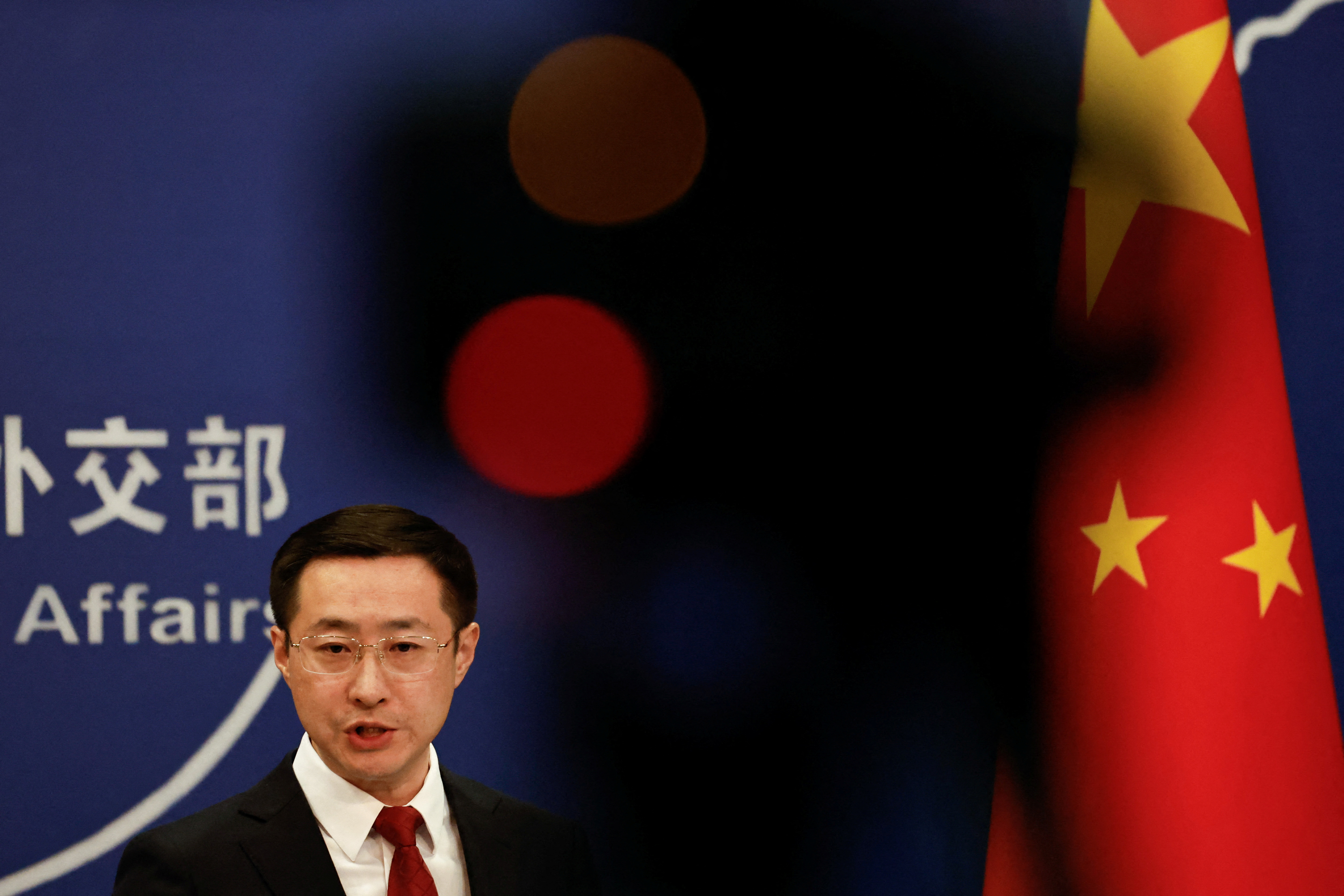 Chinese Foreign Ministry spokesperson Lin Jian attends a news conference.