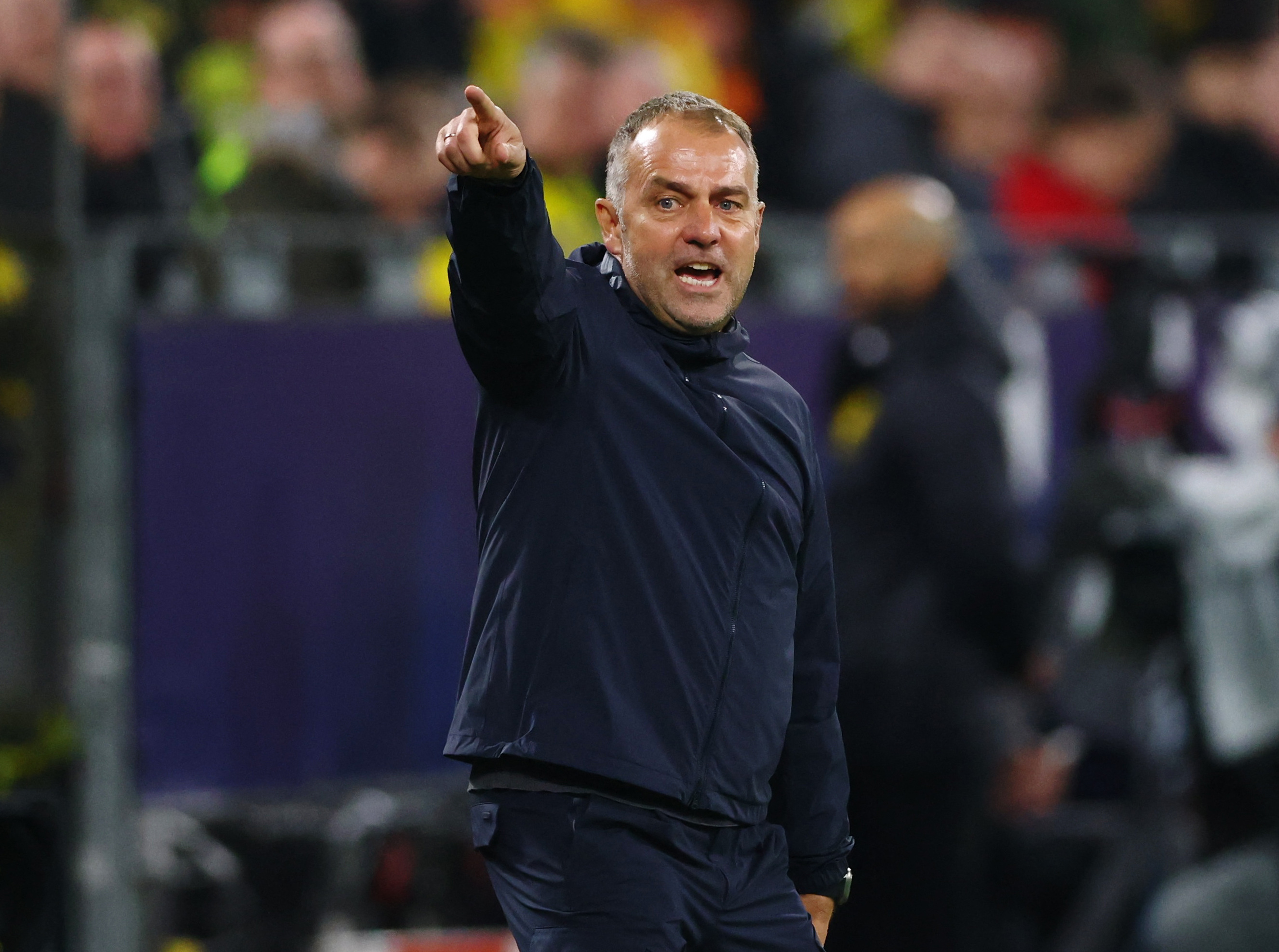 Soccer Football - Champions League - Quarter Final - Second Leg - Borussia Dortmund v FC Barcelona - Signal Iduna Park, Dortmund, Germany - April 15, 2025 FC Barcelona coach Hansi Flick REUTERS/Thilo Schmuelgen