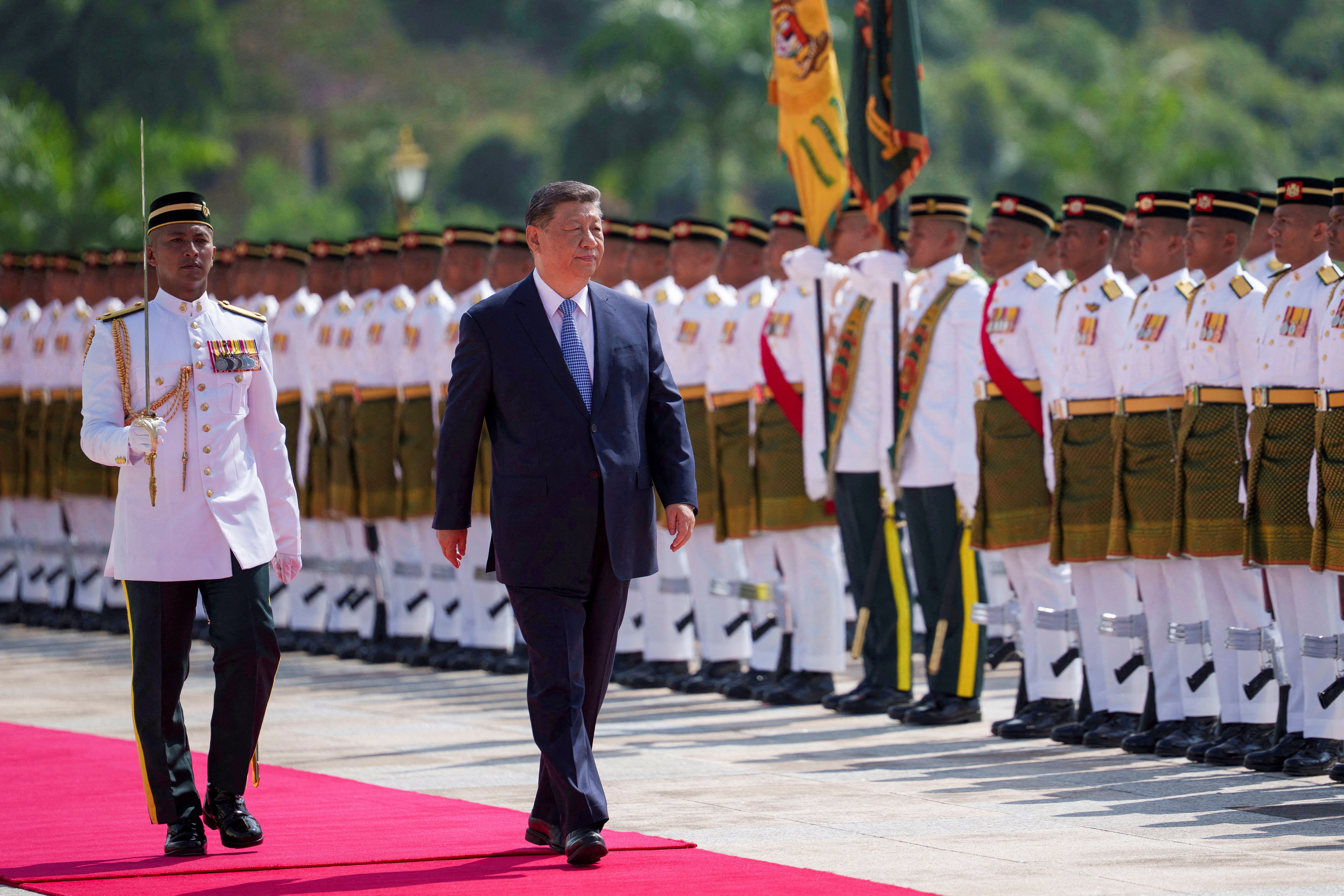 Chinese President Xi Jinping inspects an honour guard during the official welcoming ceremony at the national palace in Kuala Lumpur, Malaysia, Wednesday, April 16, 2025. Vincent Thian/Pool via REUTERS REFILE - QUALITY REPEAT