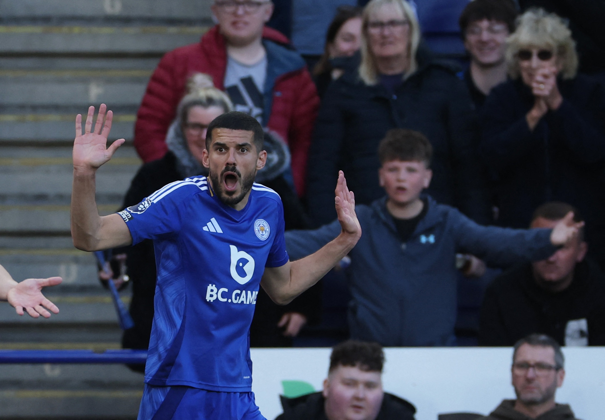 Coady holds his hands up in shock