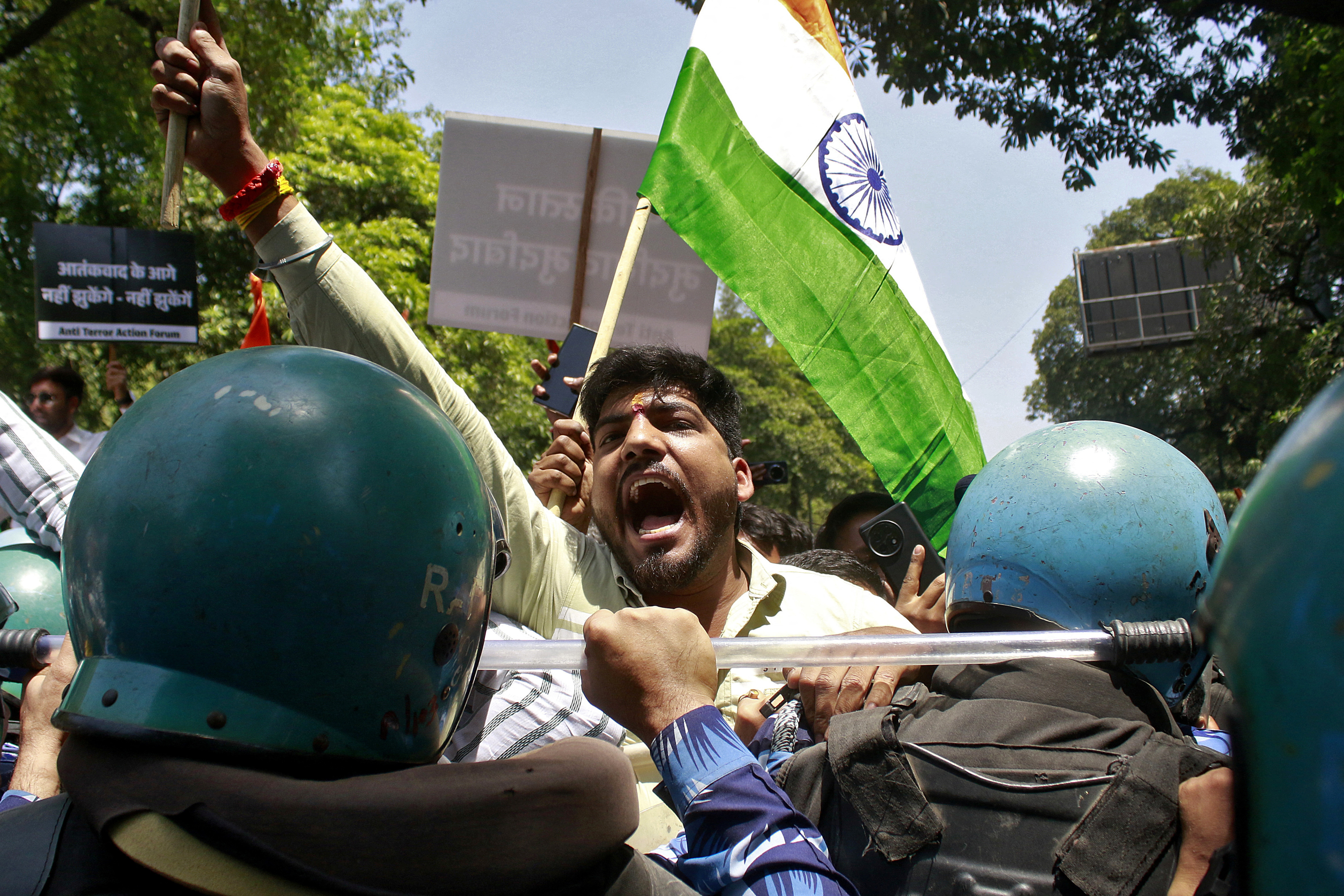 A demonstrator shouts slogans as he is stopped by police during a protest against the attack on tourists in Baisaran area of south Kashmir's Pahalgam, near the Pakistan High Commission in New Delhi, India, April 24, 2025.
