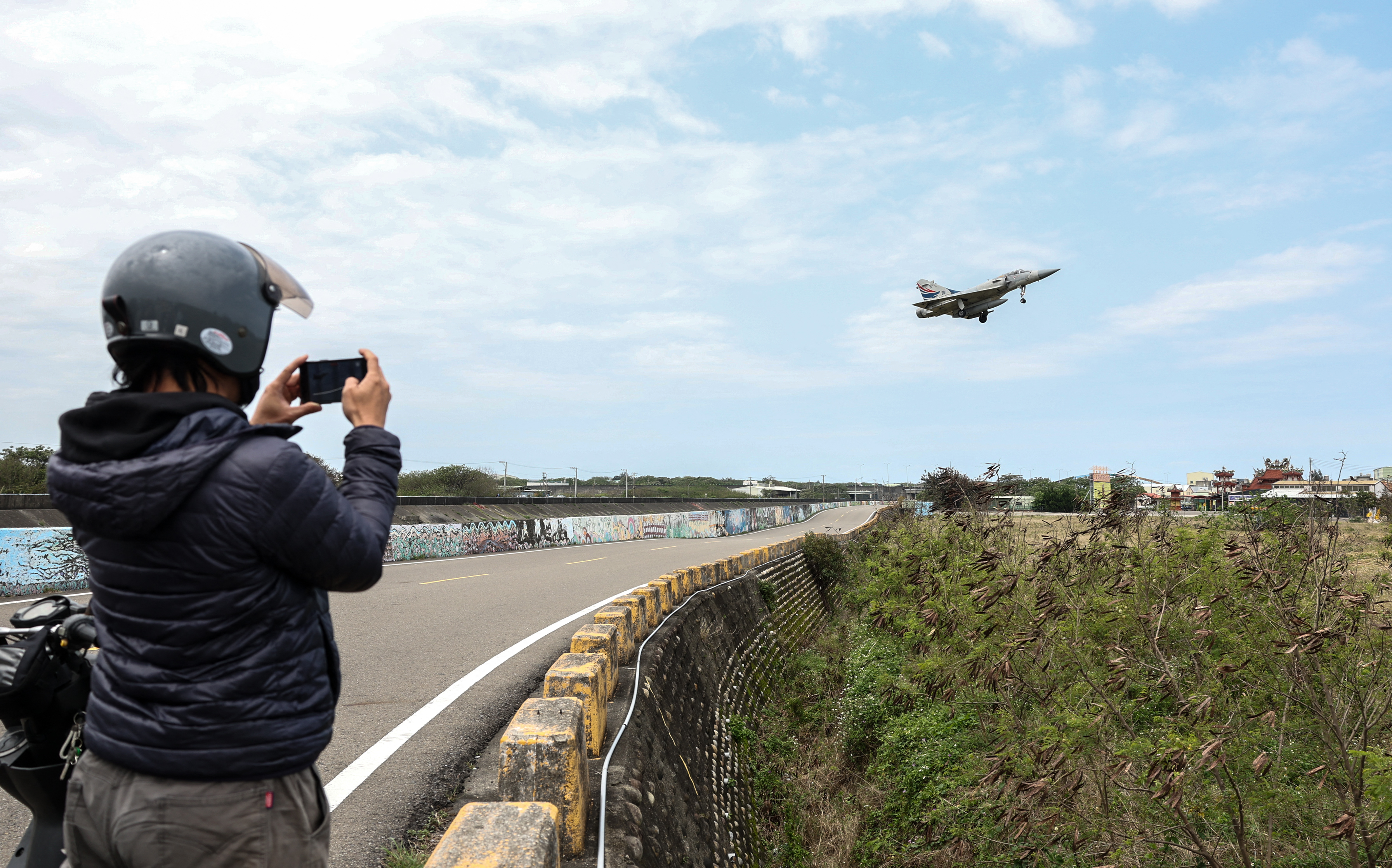 A Taiwan Air Force Mirage 2000 fighter jets prepares to land at the Hsinchu Airbase in Hsinchu on April 2, 2025. The Chinese military announced new exercises on April 2, in sensitive waters near Taiwan, in a second consecutive day of drills around the self-ruled island it claims as its own. (Photo by I-HWA CHENG / AFP)