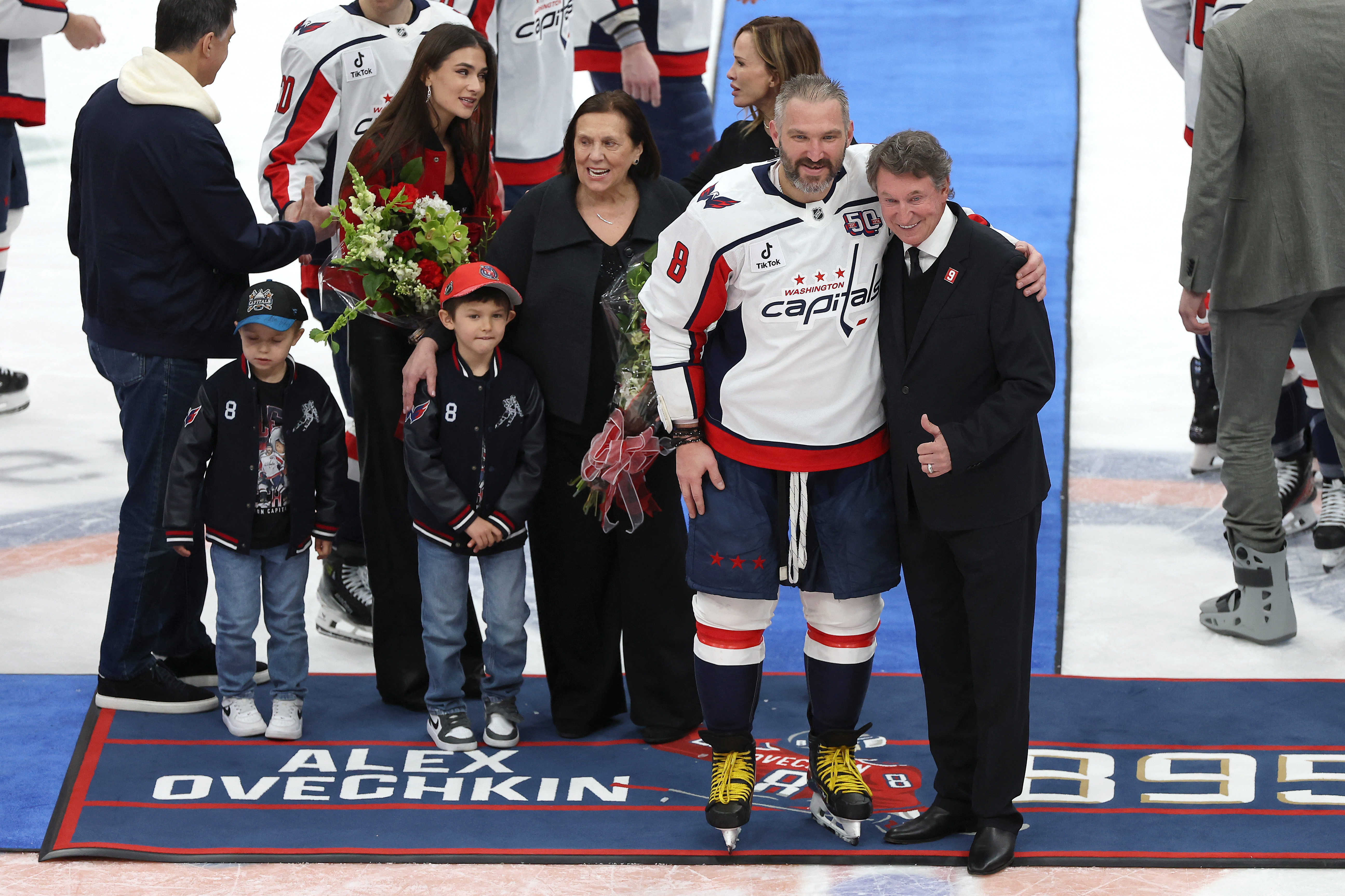 Alexander Ovechkin and Wayne Gretzky react.