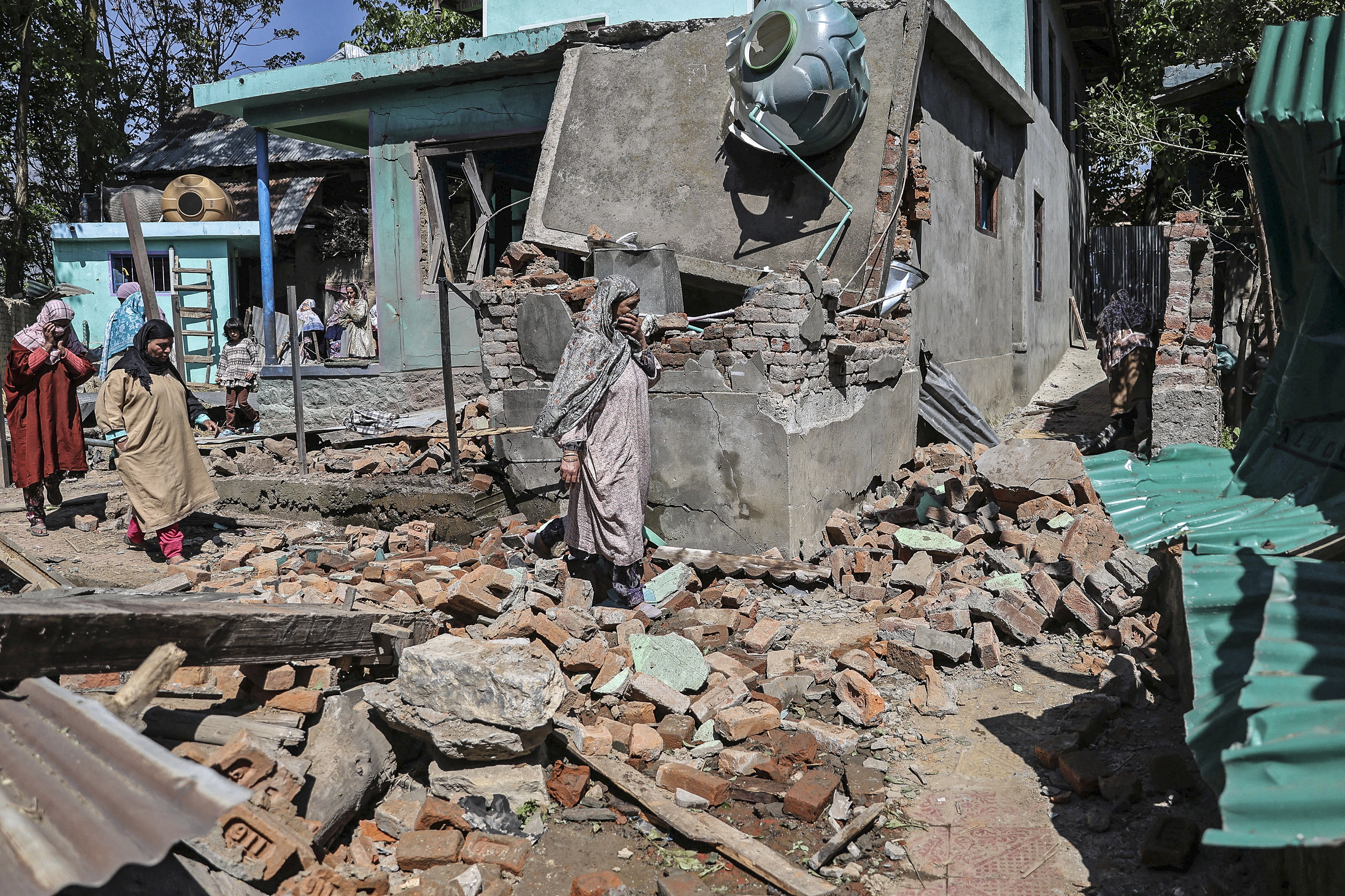 Homes destroyed in Kashmir after deadly attack sparks manhunt