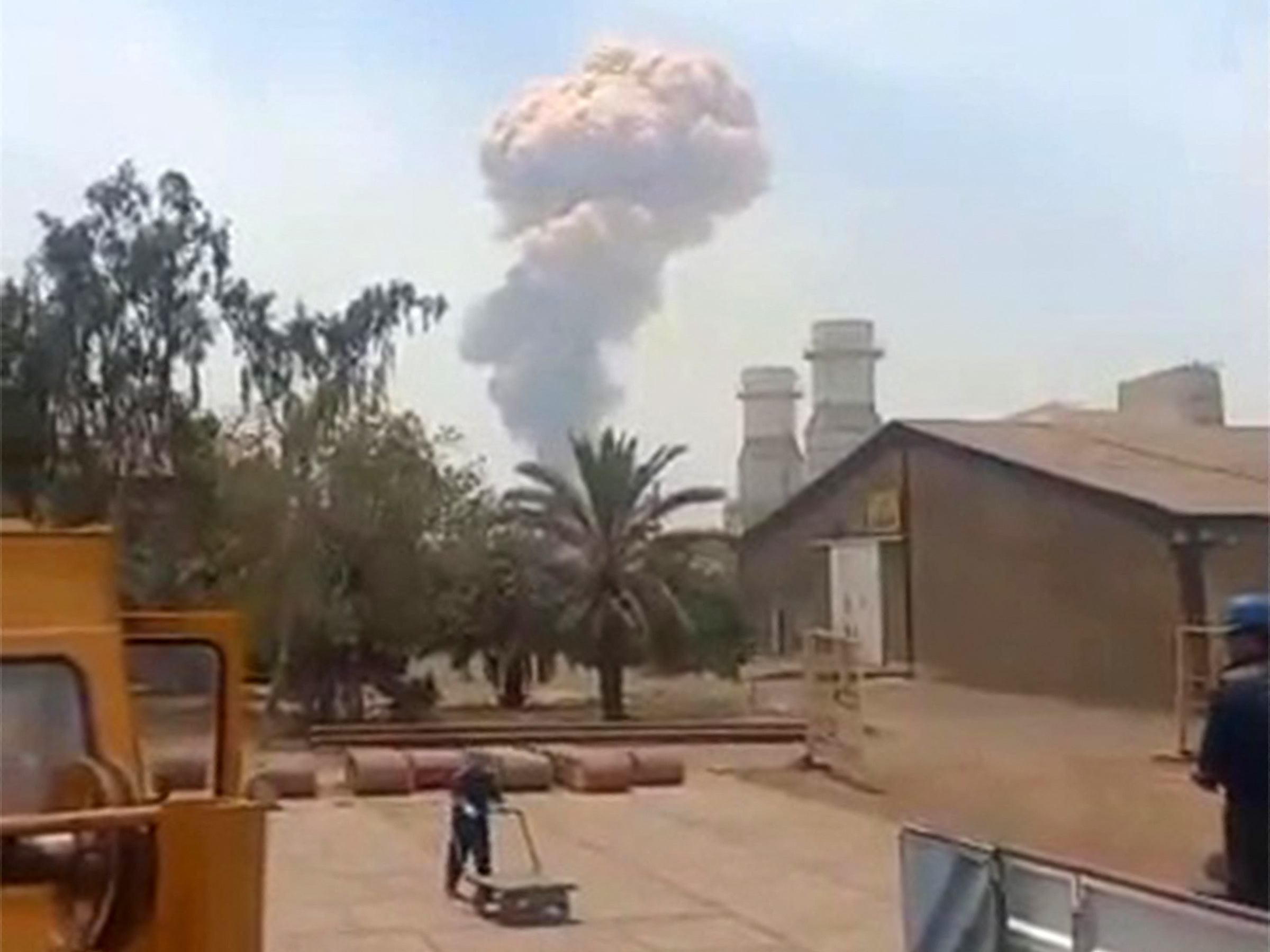 This image grab taken from footage released by the state television Islamic Republic of Iran Broadcasting News (IRIBNEWS) on April 26, 2025 shows smoke billowing following an explosion at the Shahid Rajaee port dock southwest of Bandar Abbas in the Iranian province of Hormozgan. Several containers exploded on April 26 at Iran's largest commercial port, authorities said, causing a major blast and fire, and leaving several people injured. Shahid Rajaee, more than 1,000 kilometres (620 miles) south of the capital, is the most advanced container port in Iran, according to the official IRNA news agency. (Photo by IRIBNEWS / AFP) / RESTRICTED TO EDITORIAL USE - MANDATORY CREDIT "AFP PHOTO / HO / IRIBNEWS" - NO MARKETING NO ADVERTISING CAMPAIGNS - DISTRIBUTED AS A SERVICE TO CLIENTS /NO RESALE/ NO ACCESS ISRAEL MEDIA/PERSIAN LANGUAGE TV