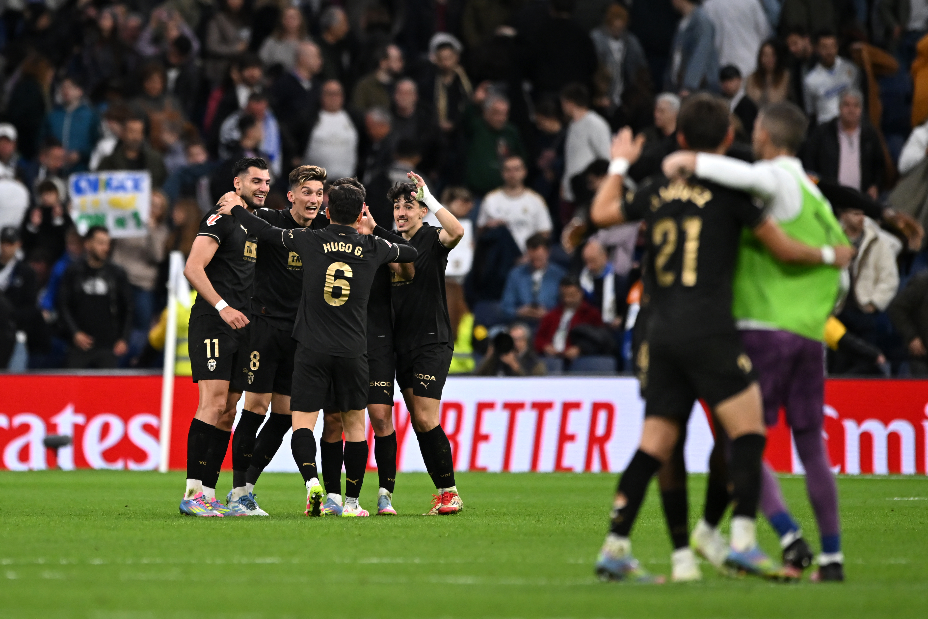 MADRID, SPAIN - APRIL 05: Rafa Mir, Pepelu, Hugo Guillamon and Diego Lopez of Valencia CF celebrate their team's victory in the LaLiga match between Real Madrid CF and Valencia CF at Estadio Santiago Bernabeu on April 05, 2025 in Madrid, Spain. (Photo by Denis Doyle/Getty Images)