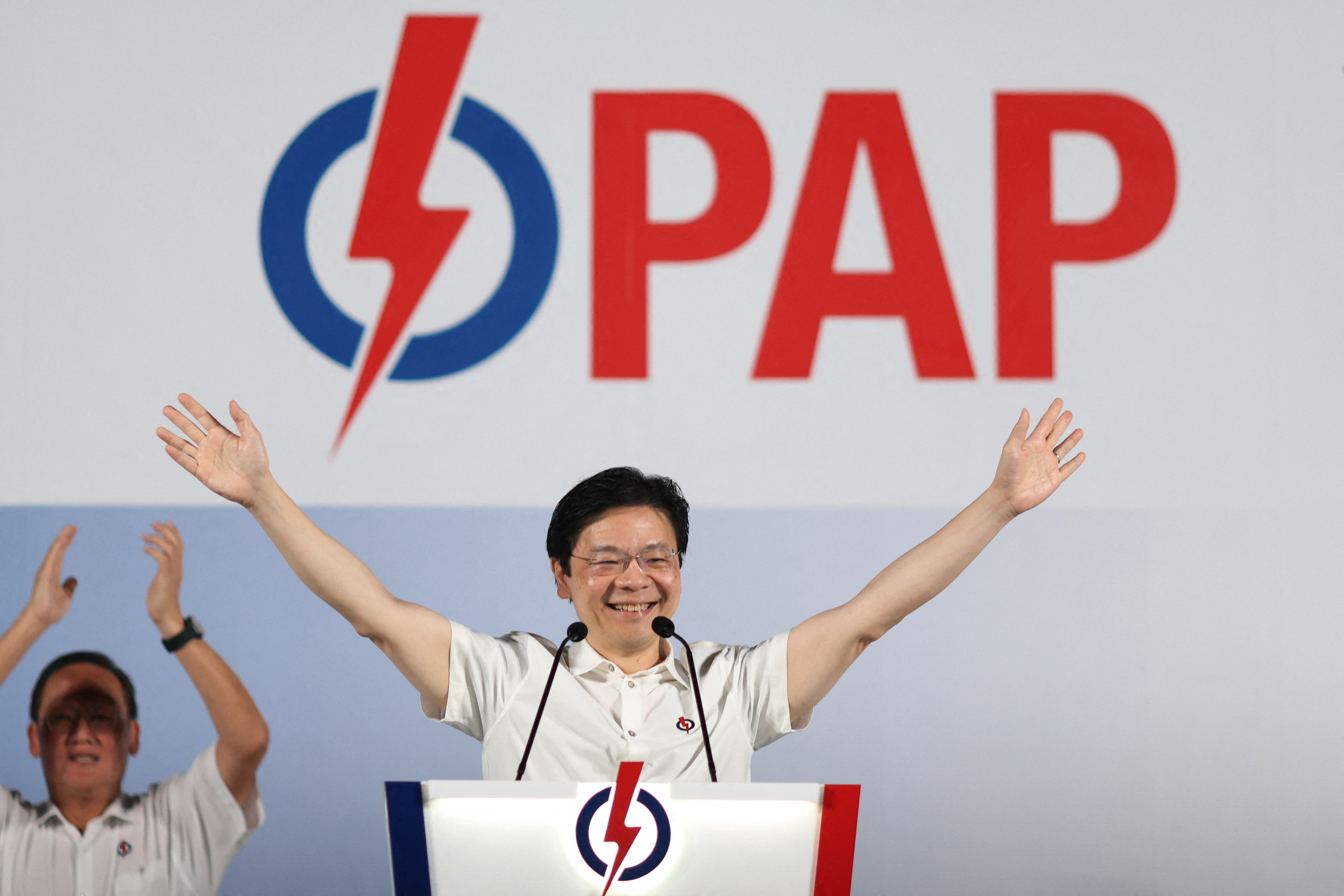 Singapore's Prime Minister Lawrence Wong gestures at a People's Action Party (PAP) rally ahead of the general election in Singapore April 26, 2025. REUTERS/Edgar Su