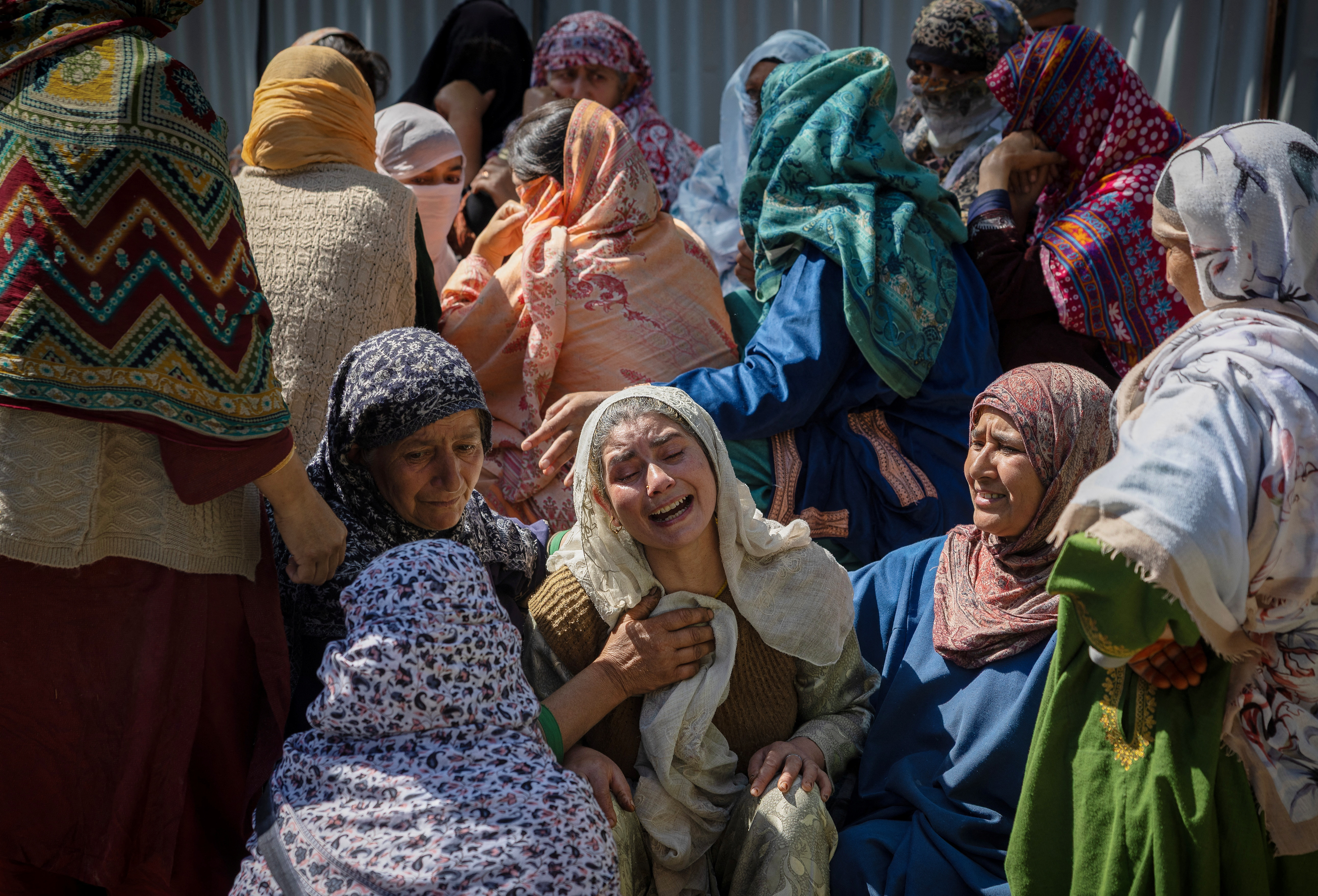 A relative cries as she sits outside Amir Nazir Wani's family house, which was destroyed by the Indian authorities, in Khasipora village in Tral, south Kashmir, April 27, 2025. REUTERS/Adnan Abidi