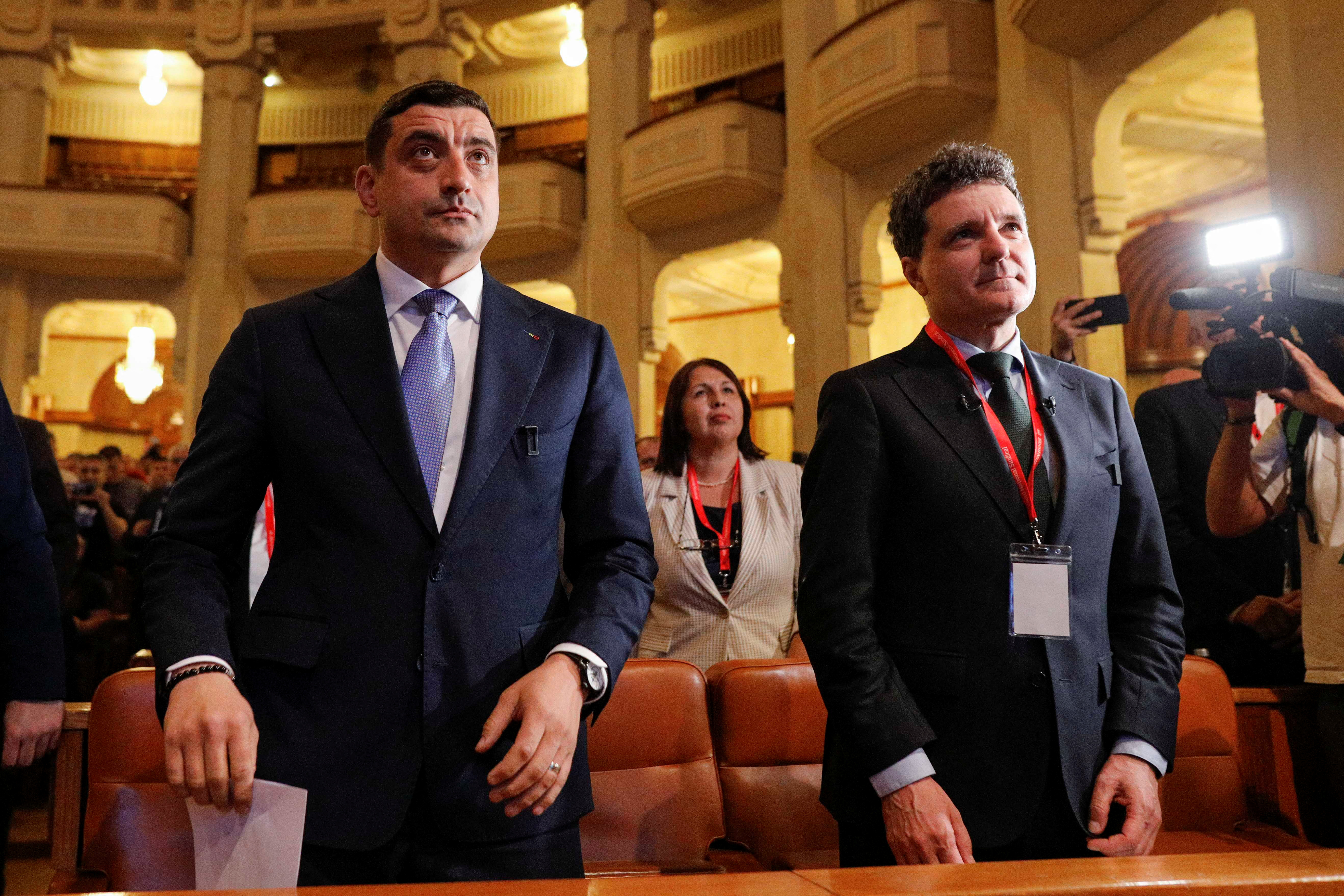 George Simion (left) and Nicusor Dan (right) attend a meeting of the National Union Bloc in Bucharest, Romania, May 7 2025. Inquam Photos/Malina Norocea via REUTERS ATTENTION EDITORS - THIS IMAGE WAS PROVIDED BY A THIRD PARTY. ROMANIA OUT. NO COMMERCIAL OR EDITORIAL SALES IN ROMANIA