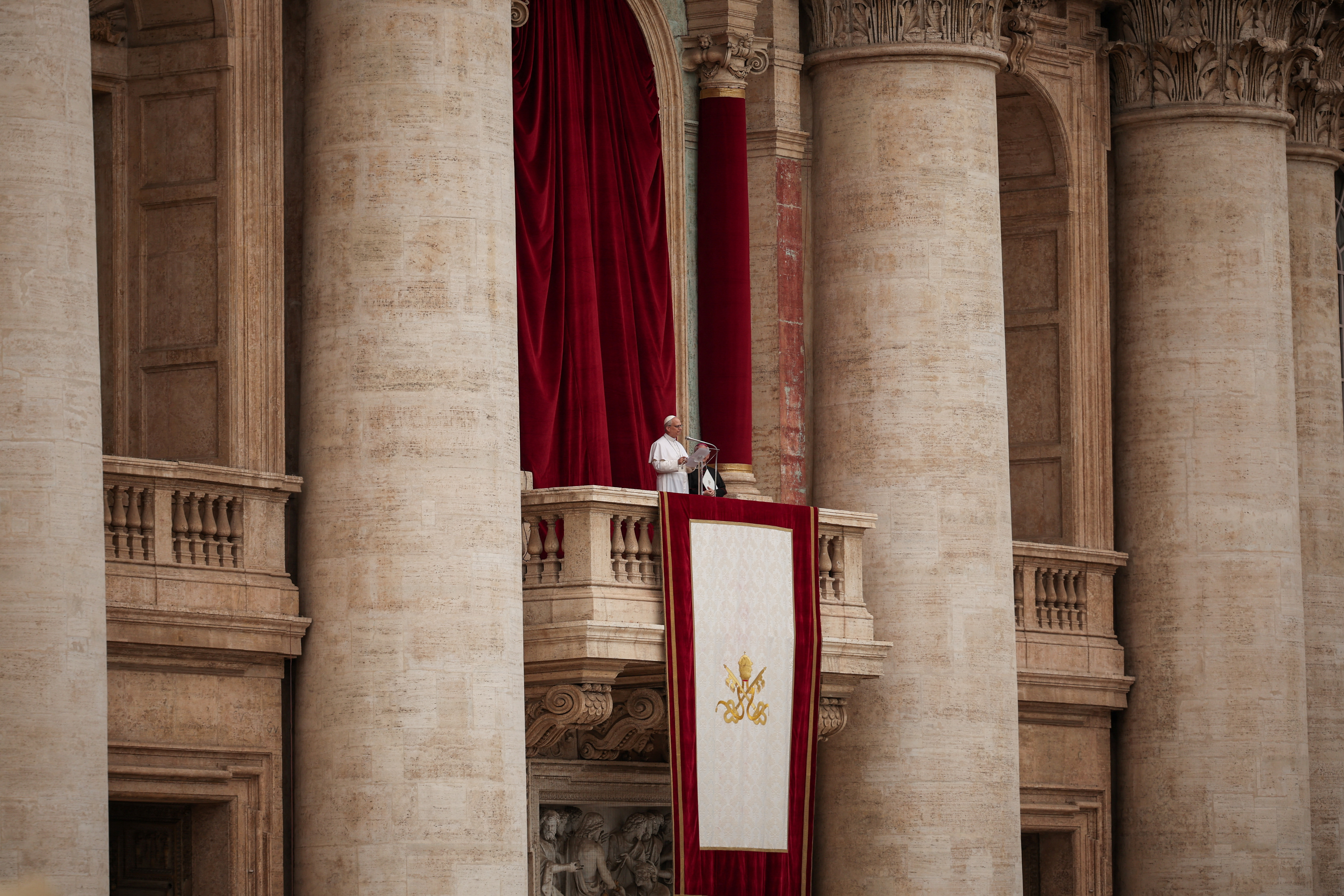 Pope Leo XIV leads a Regina Caeli prayer from the central balcony of St Peter's Basilica