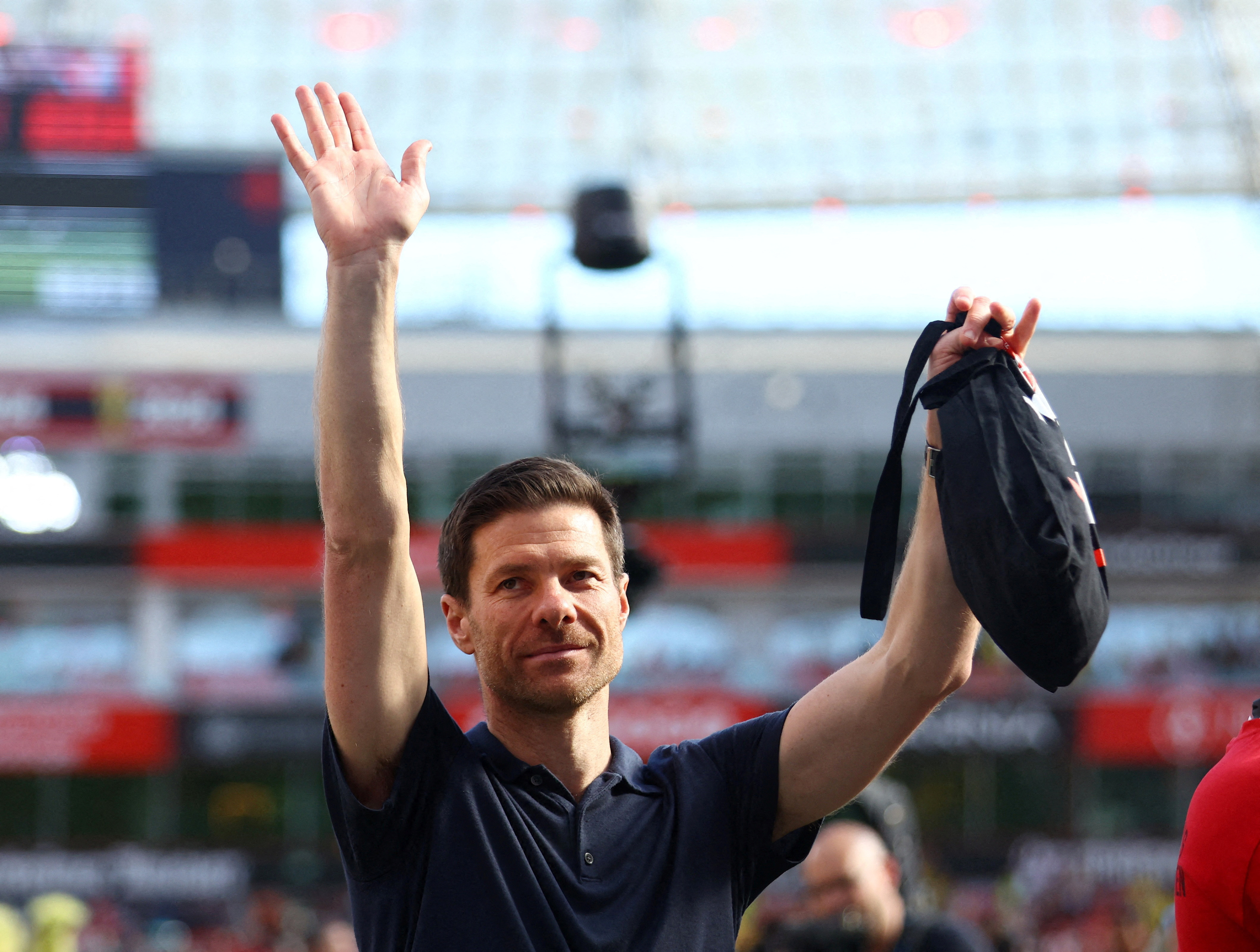 Football - Bundesliga - Bayer Leverkusen v Borussia Dortmund - BayArena, Leverkusen, Germany - Xabi Alonso applauds fans after his last home game 