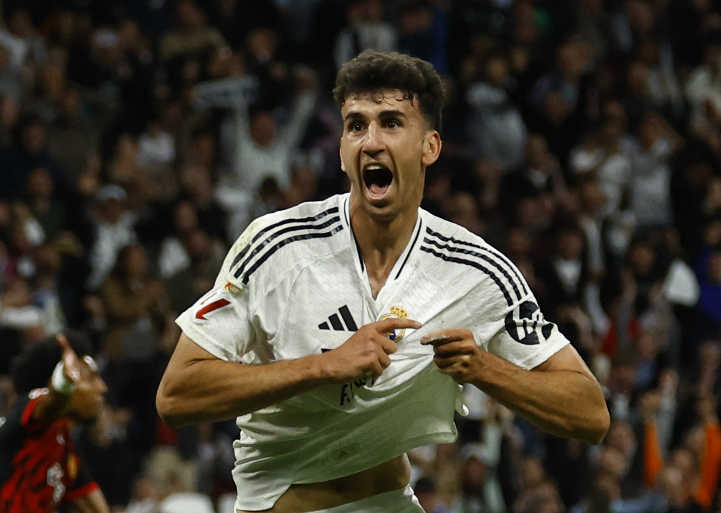 Soccer Football - LaLiga - Real Madrid v RCD Mallorca - Santiago Bernabeu, Madrid, Spain - May 14, 2025 Real Madrid's Jacobo Ramon celebrates scoring their second goal REUTERS/Susana Vera