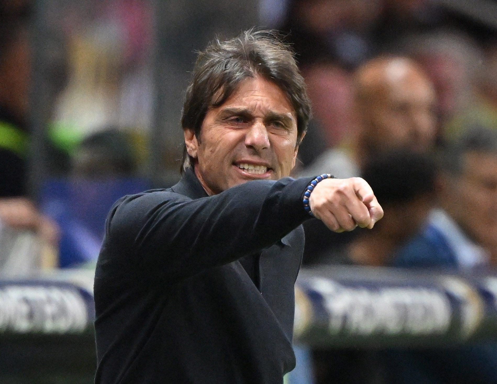 Napoli boss Antonio Conte gestures during a match.