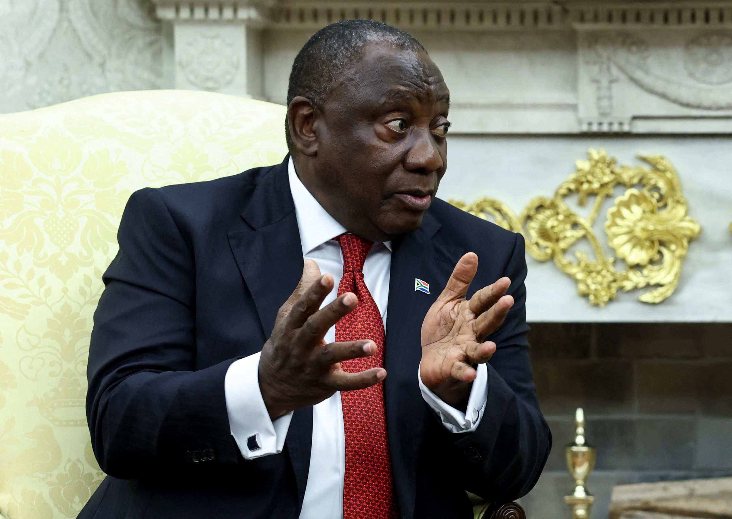 South African President Cyril Ramaphosa speaks as he meets U.S. President Donald Trump in the Oval Office of the White House in Washington