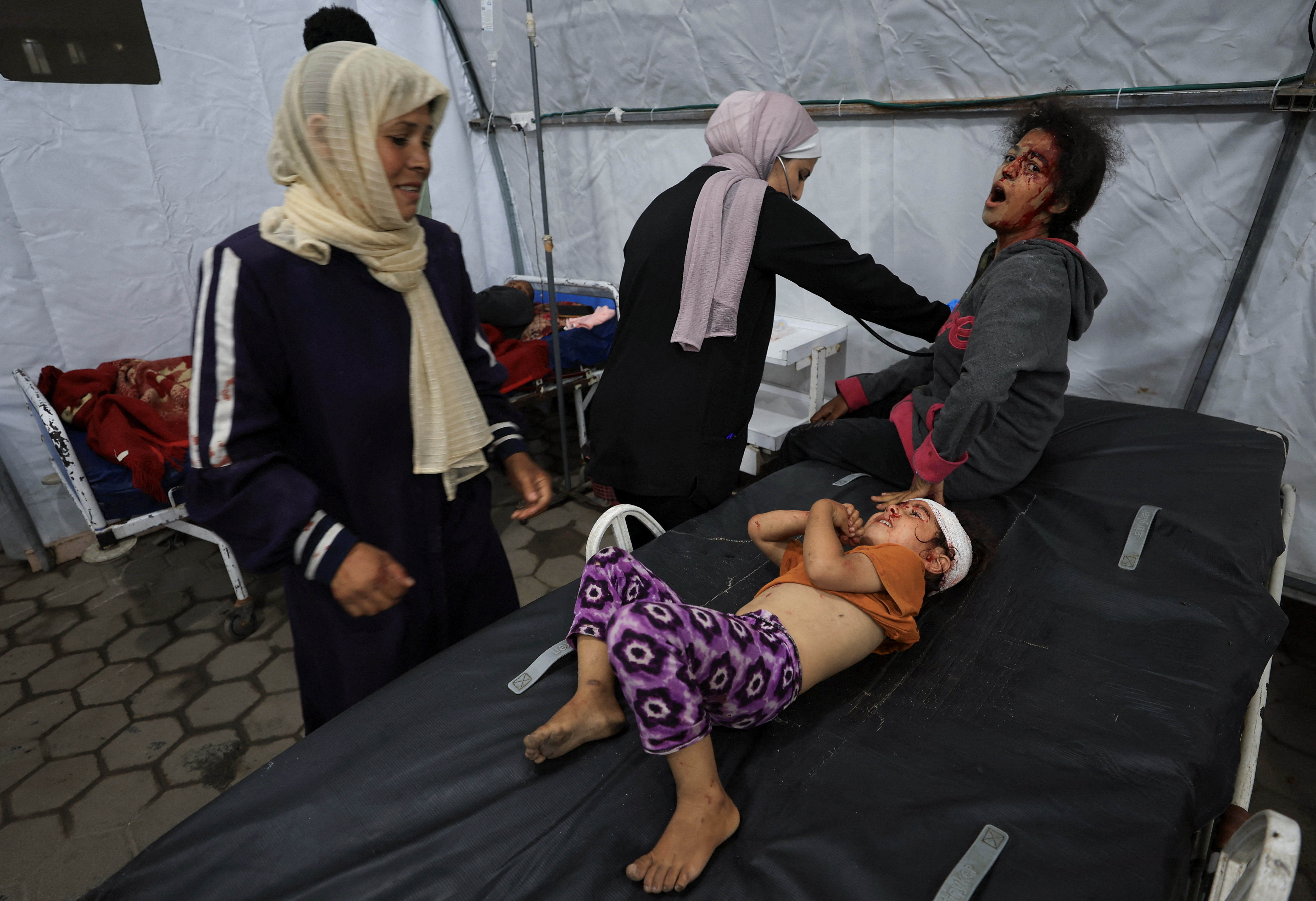 Palestinians wounded in an Israeli strike