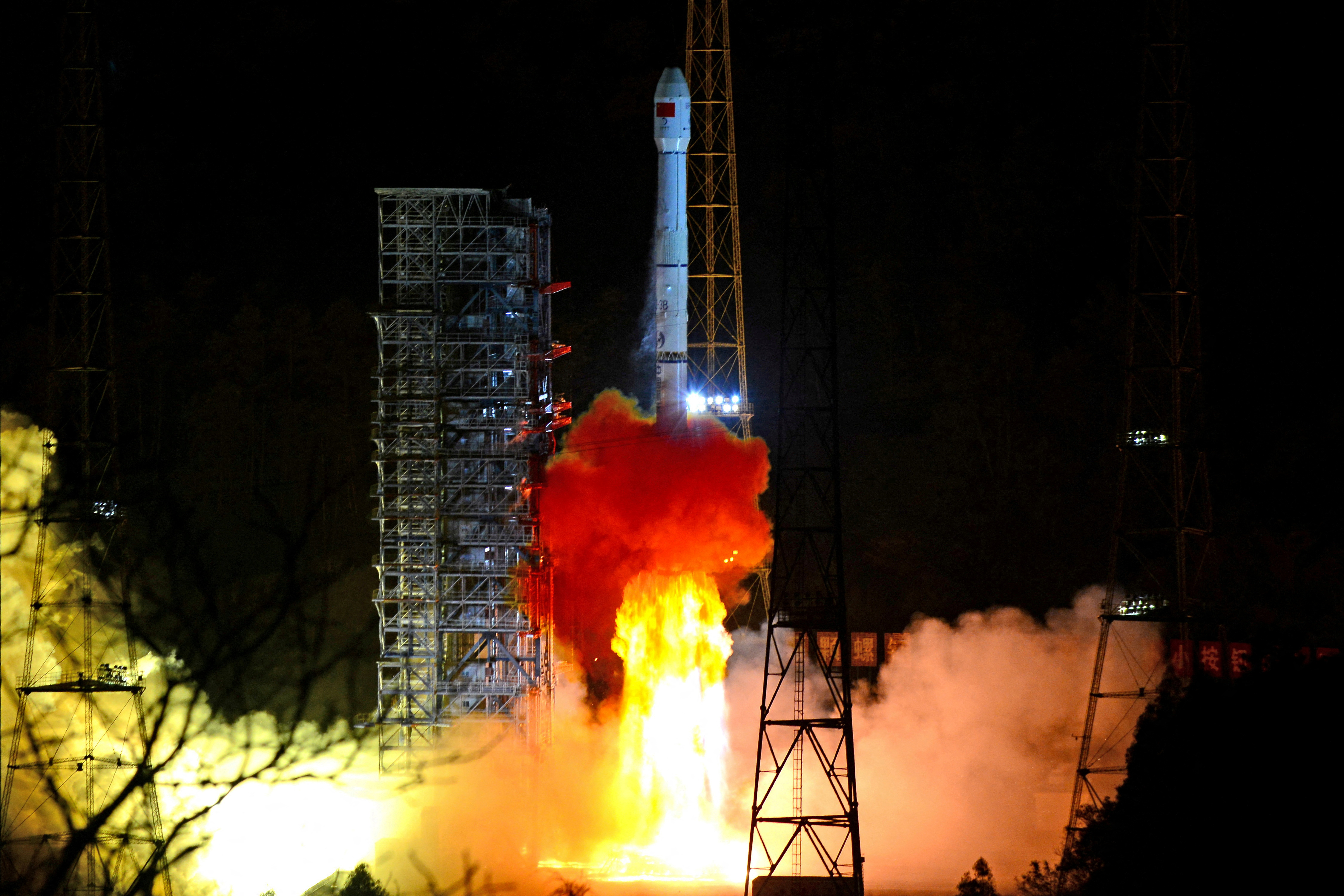 FILE PHOTO: A Long March-3B rocket carrying Chang'e 4 lunar probe takes off from the Xichang Satellite Launch Center in Sichuan province, China December 8, 2018. ATTENTION EDITORS - THIS IMAGE WAS PROVIDED BY A THIRD PARTY. CHINA OUT./File Photo