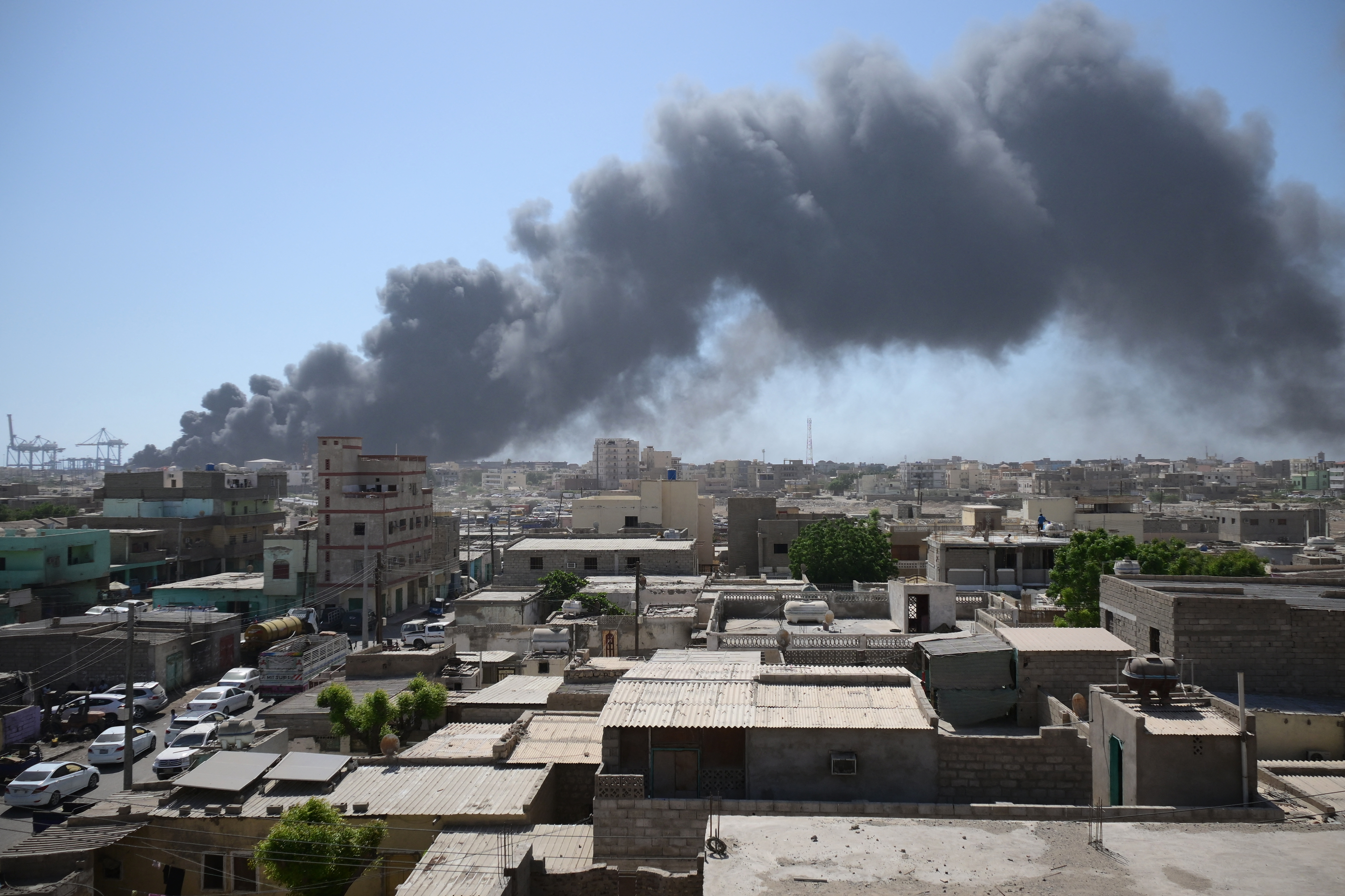 Smoke billows after a drone strike on the port of Port Sudan on May 6, 2025.