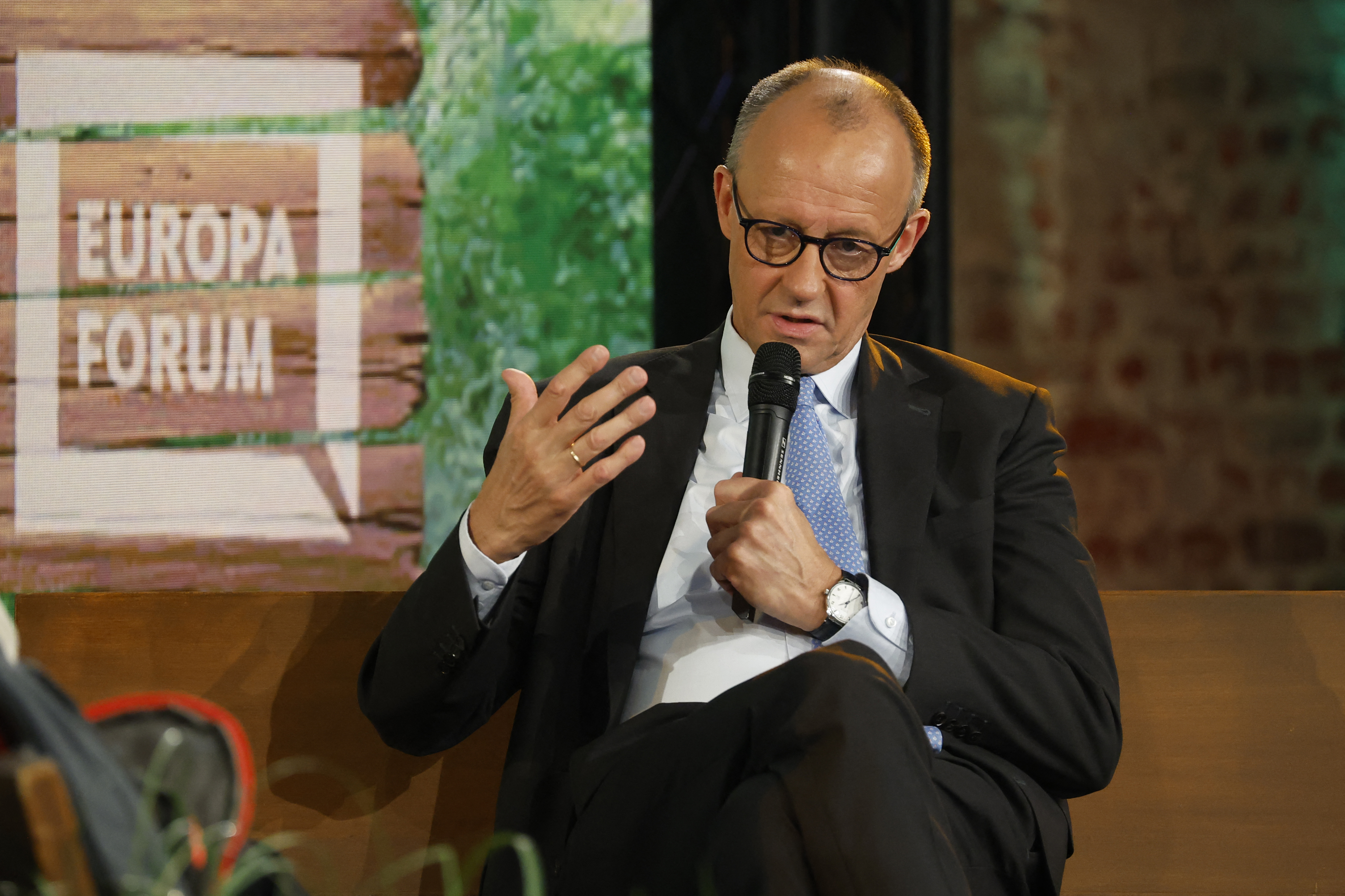 German Chancellor Friedrich Merz takes part in a discussion on 'Wars, crises, chancellorship: German answers to European questions' on stage of the 'Re:Publica 25' fair ground during the opening day of the 'Re:publica 25' digital conference in Berlin on May 26, 2025. 