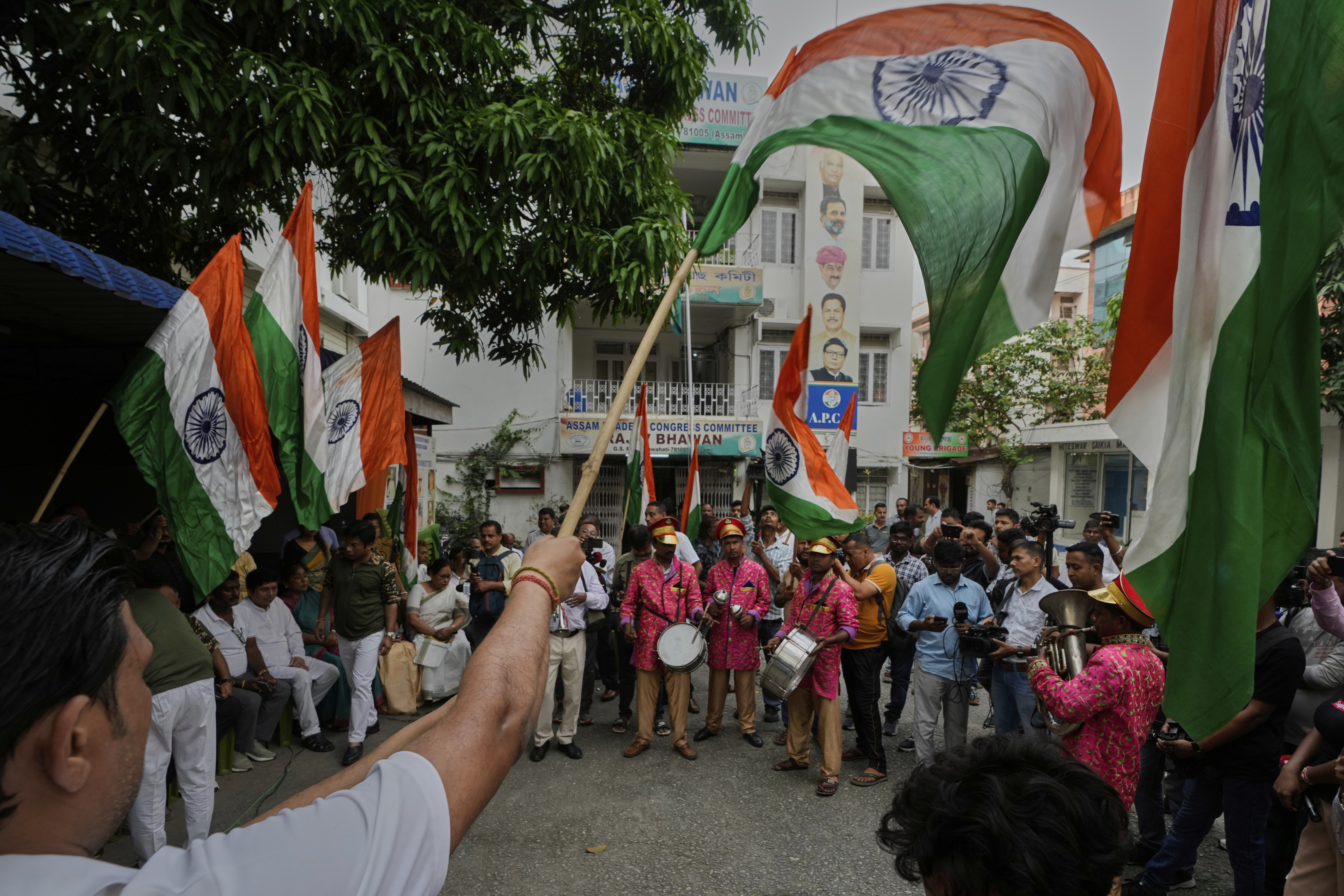 Indian National Congress workers hold Indian national flags in support of the Indian Army as they celebrate the success of 'Operation Sindoor', strike against Pakistan, in Guwahati, India, Friday, May 9, 2025. (AP Photo/Anupam Nath)