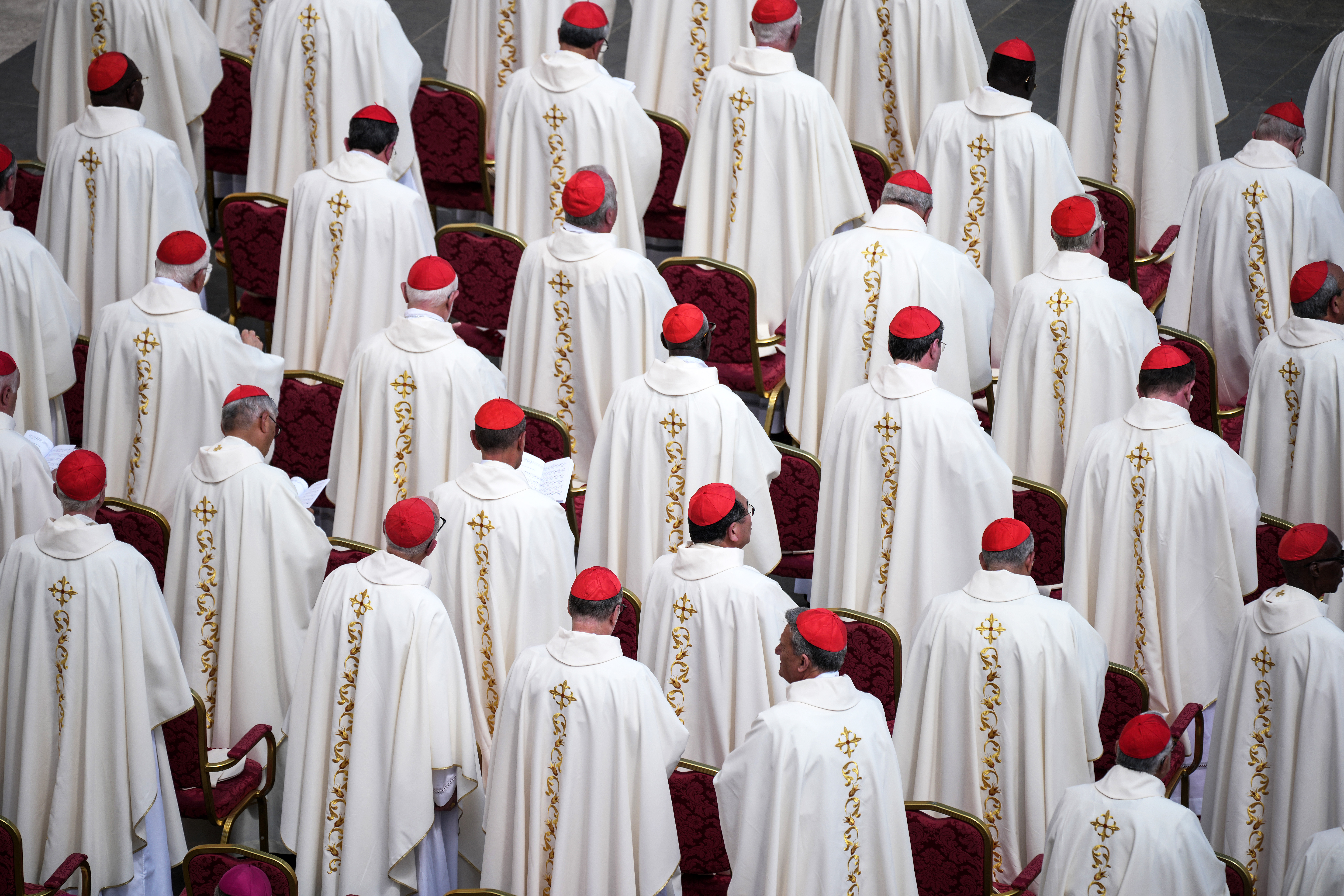 VATICAN CITY, VATICAN - APRIL 27: Cardinals attend the Holy Mass on Divine Mercy, on the second day of mourning for Pope Francis on April 27, 2025 in Vatican City, Vatican. Funeral rites for the late Pope Francis are held for nine days after his burial as he is mourned and celebrated by the faithful. The congregation was made up of tens of thousands of youths taking part in the Catholic jubilee year. During this time, the Vatican prepares for the process to elect a new Pope, known as the Conclave, which must begin within 15 to 20 days of the Pope's death. (Photo by Christopher Furlong/Getty Images)