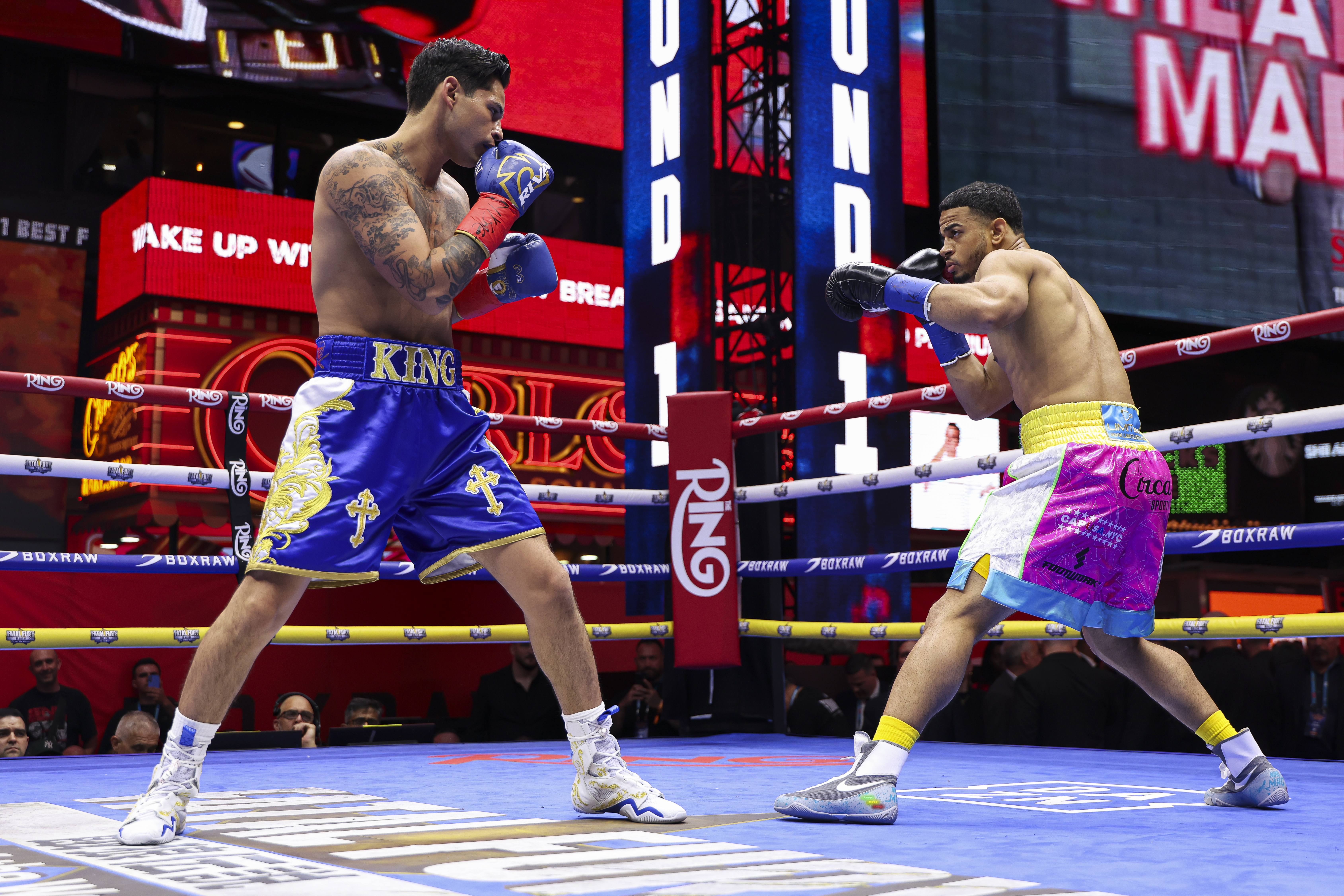 NEW YORK, NEW YORK - MAY 02: Ryan Garcia and Rolly Romero face off during a fight for the WBA Welterweight title in Times Square on May 02, 2025 in New York City. (Photo by Cris Esqueda/Golden Boy/Getty Images)