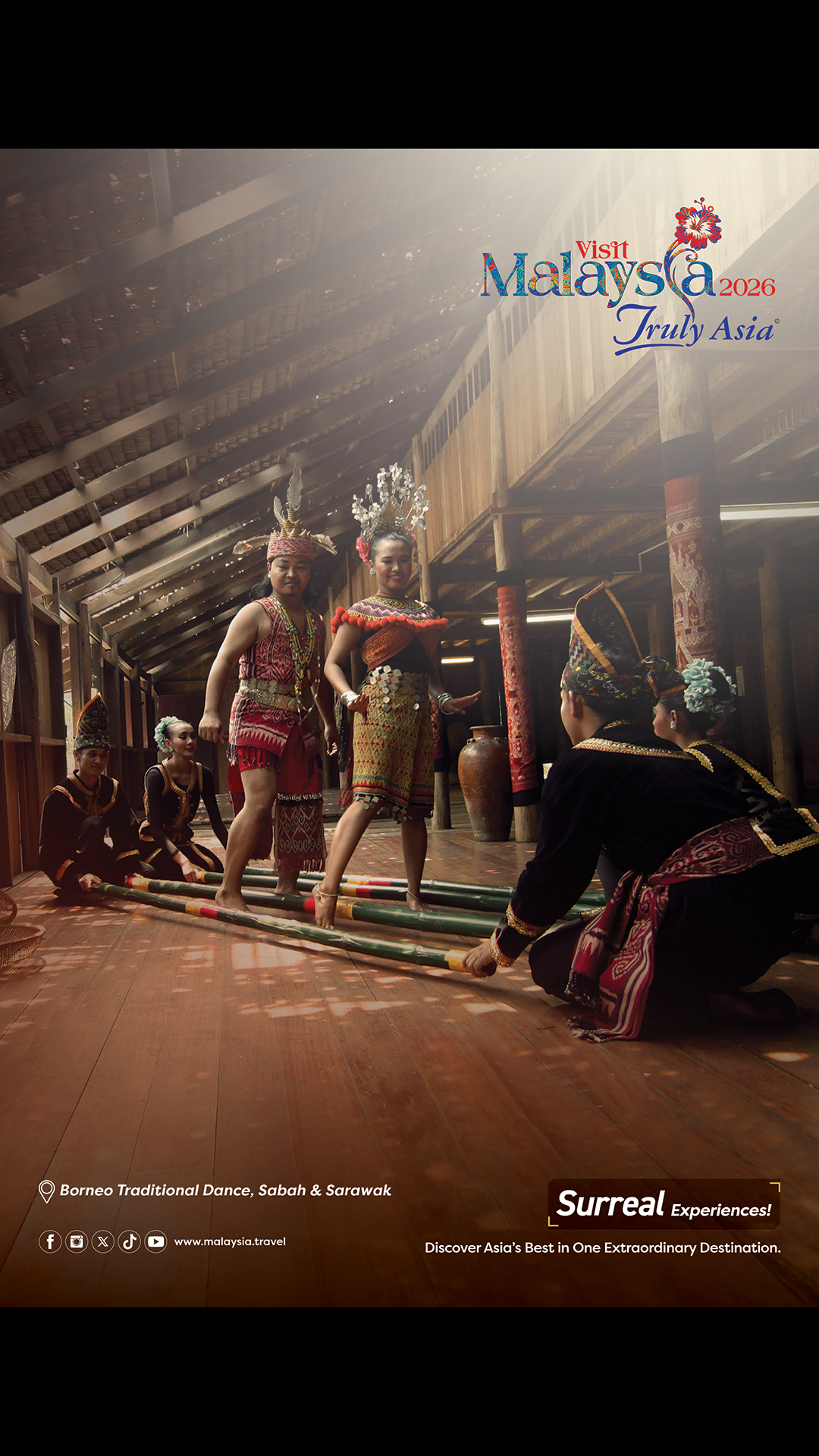 Two women perform a traditional dance