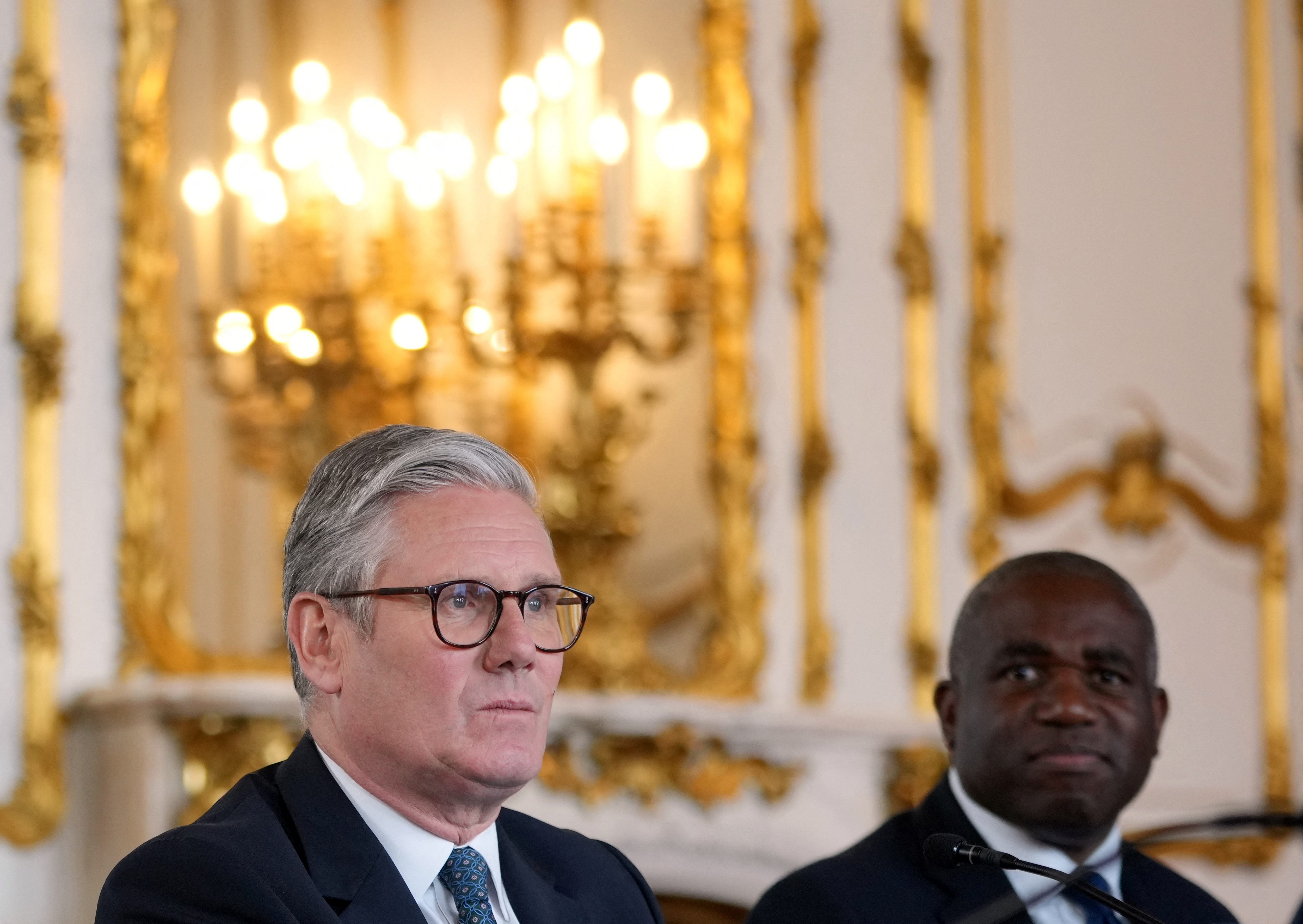 Britain's Prime Minister Keir Starmer and Foreign Secretary David Lammy attend a meeting.